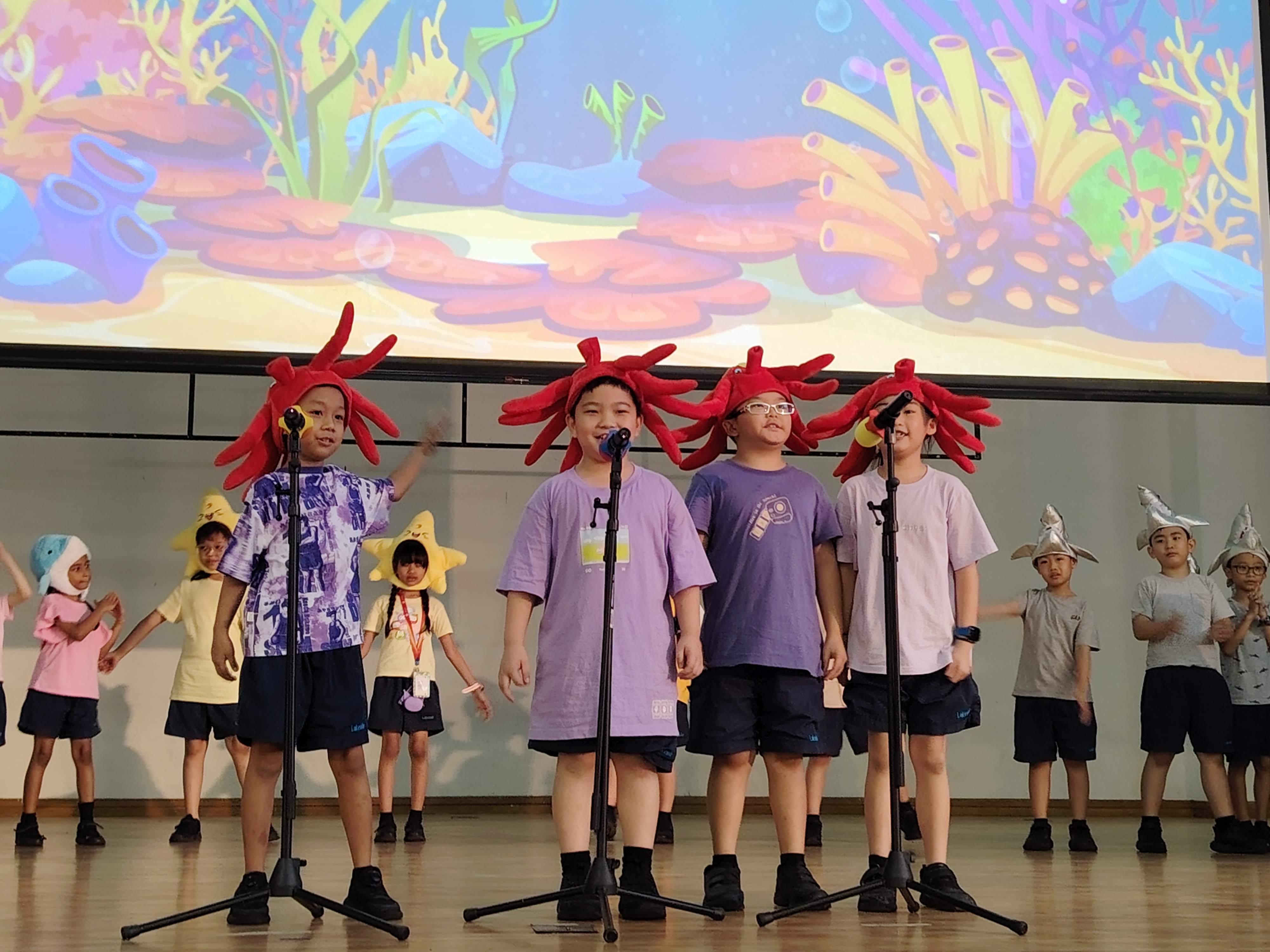 Primary 2 students showcasing their talents and learning through captivating performances.