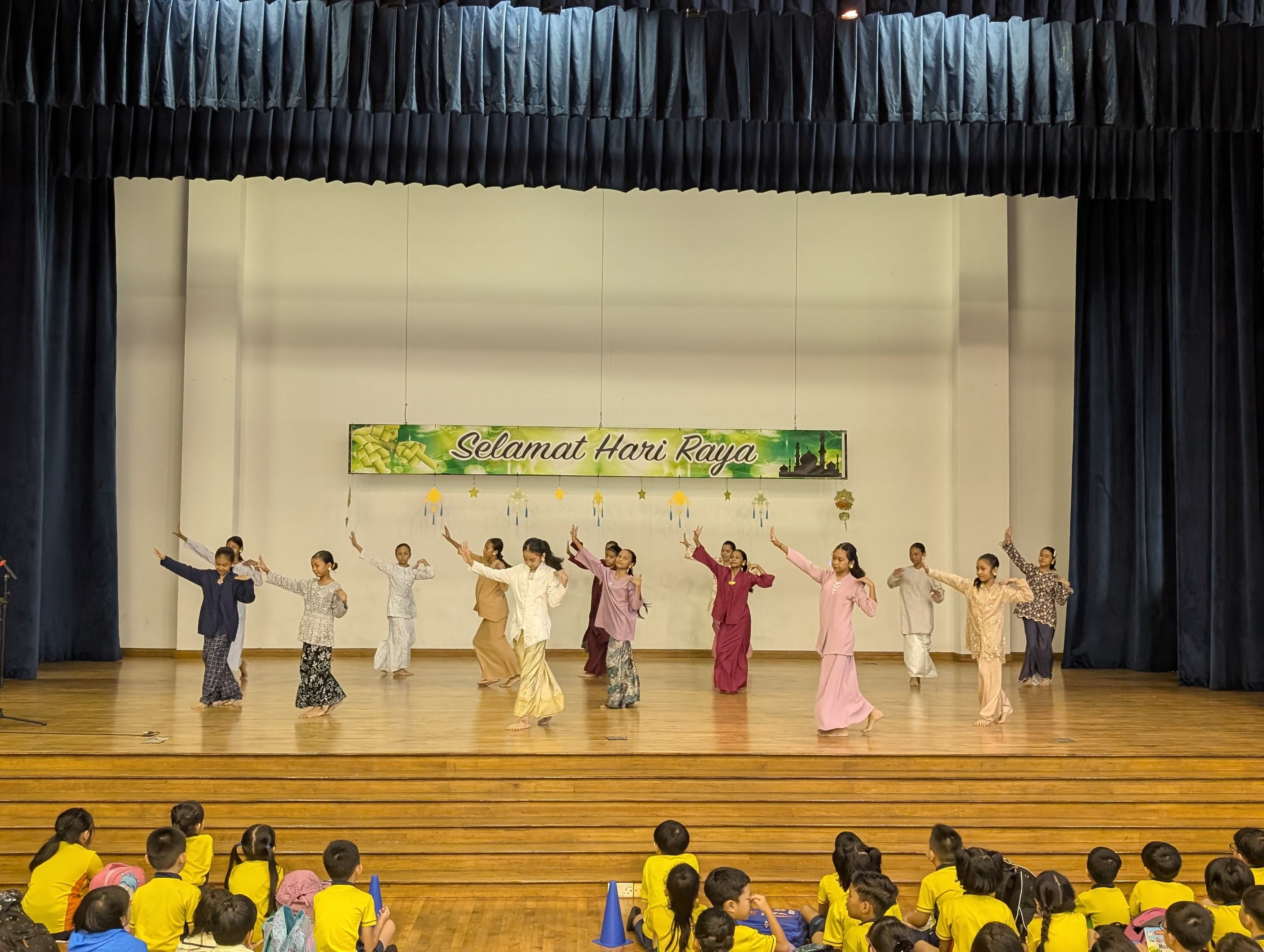 All the dancers on stage performing a beautiful dance