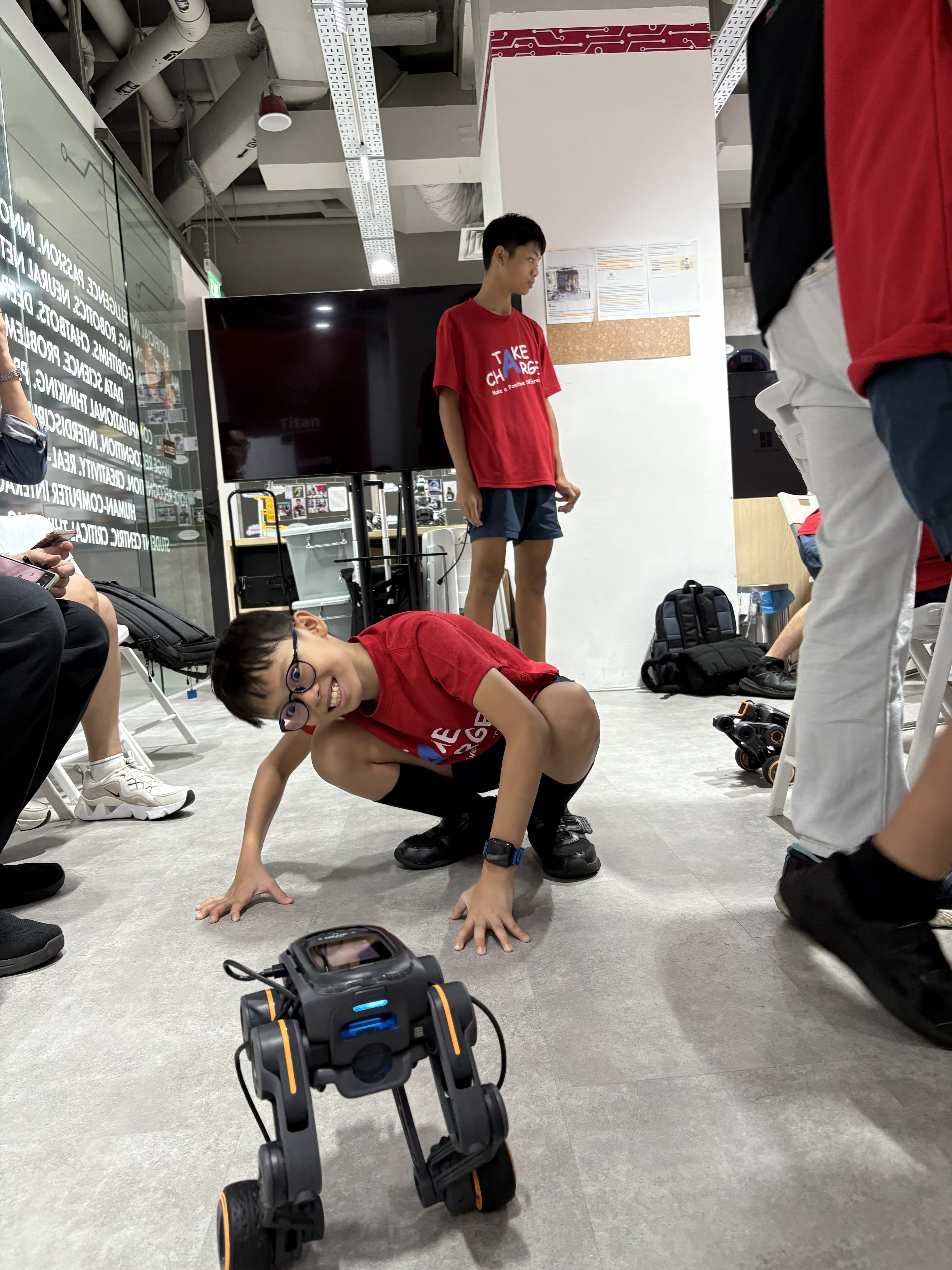 A student eagerly tests out the AI image recognition capability of the AI Bot
