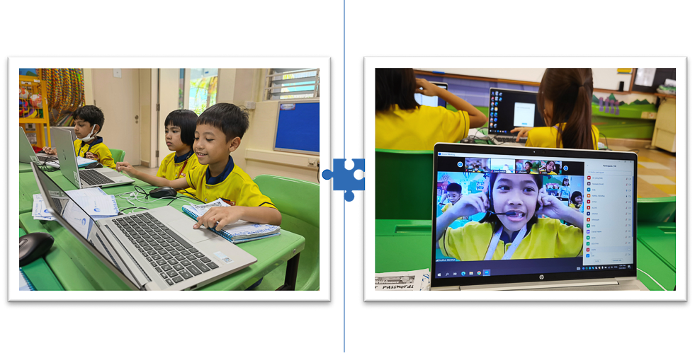 Children in yellow uniforms using laptops in a classroom, with a video call showing a smiling girl on screen.