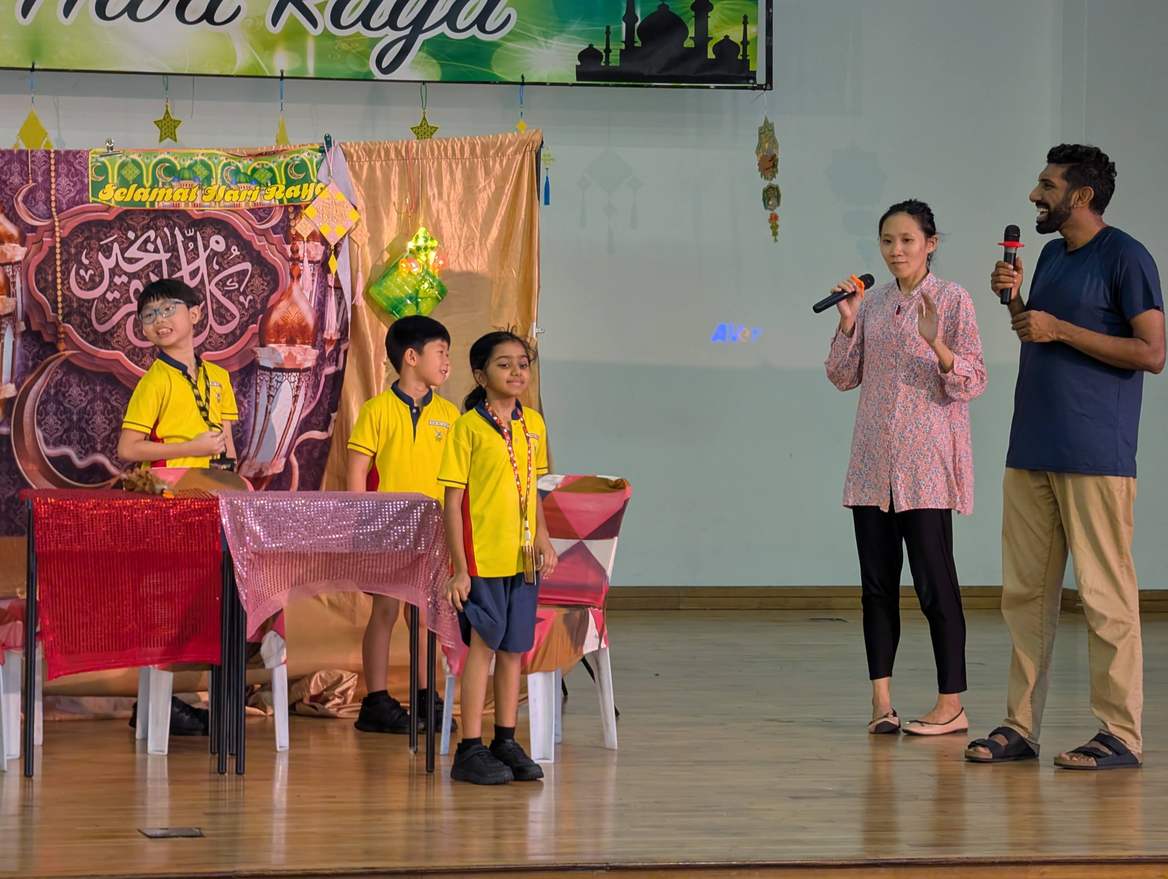Students on stage participating in the skit