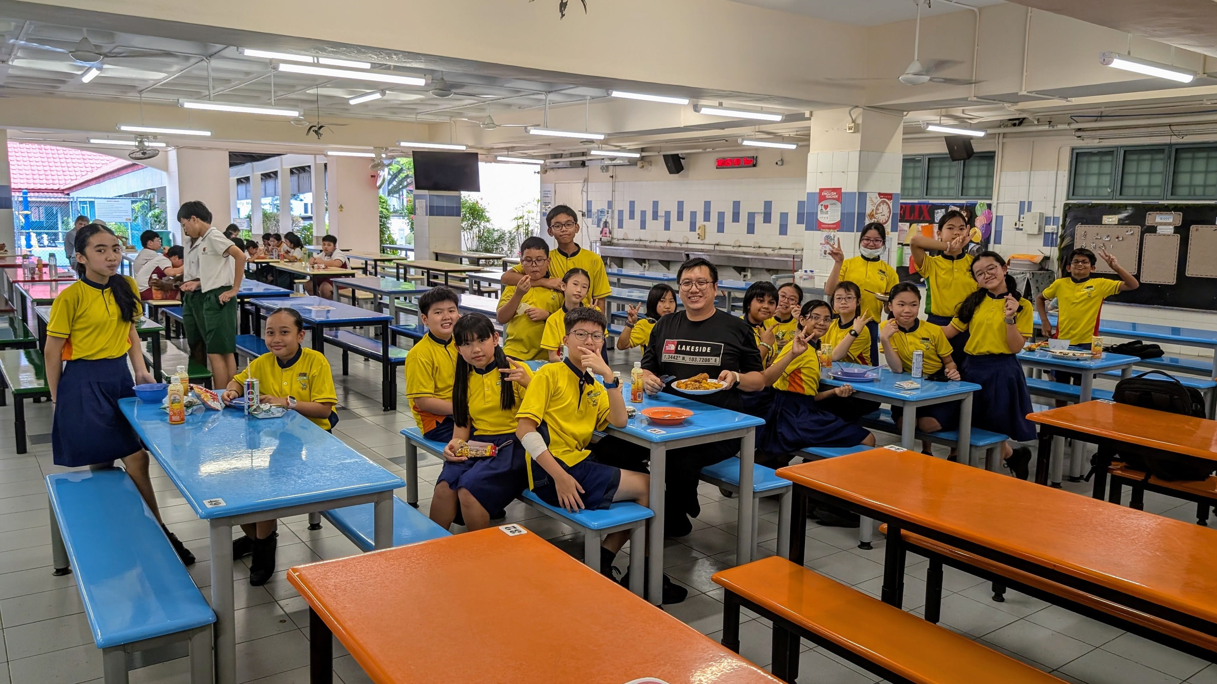 Students enjoy lunch time at Rulang Primary School