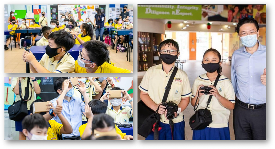 Students in yellow uniforms and masks use phones and VR viewers, while two pose with cameras beside an adult.