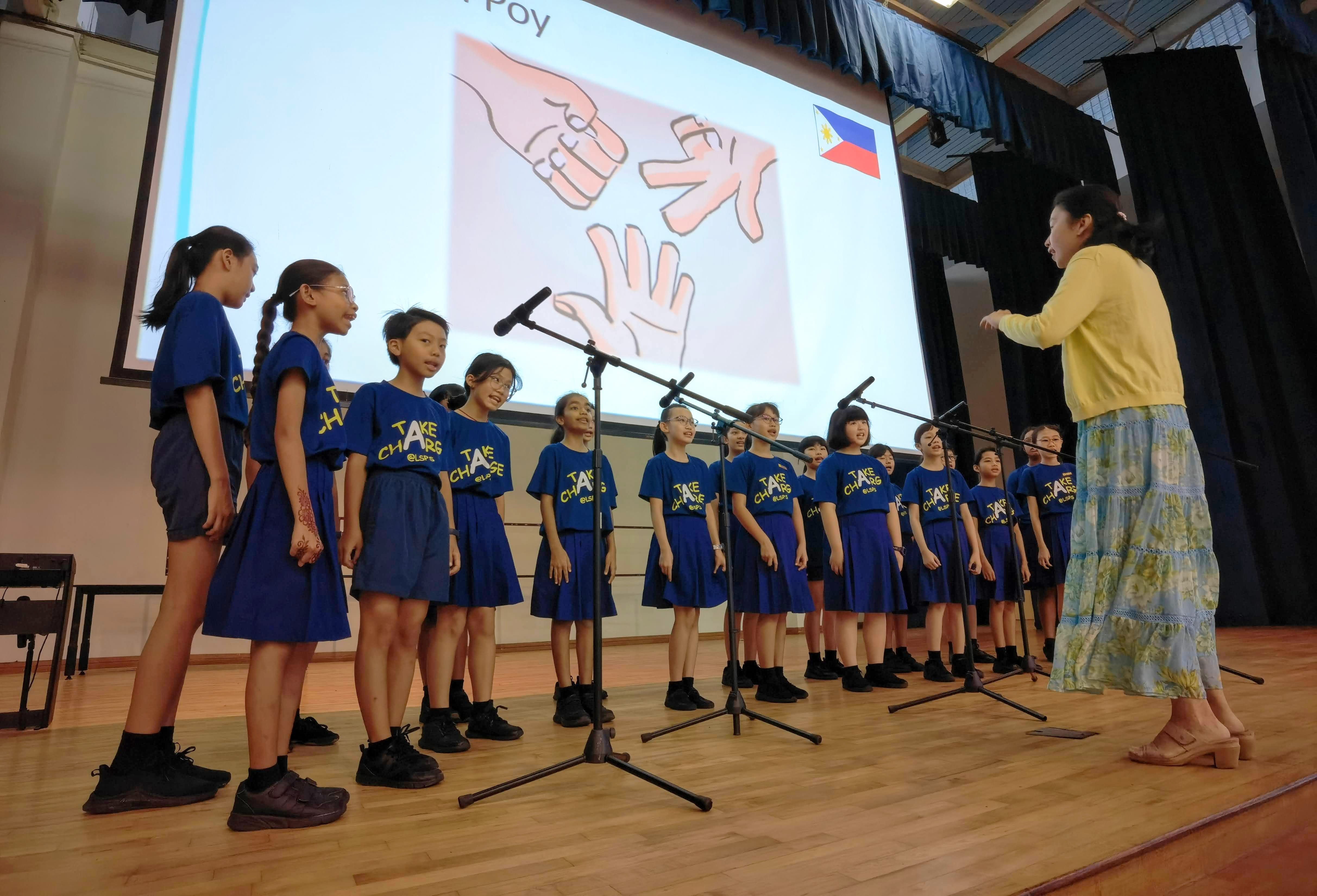 Choir singing a song from one of the ASEAN members, Philippines