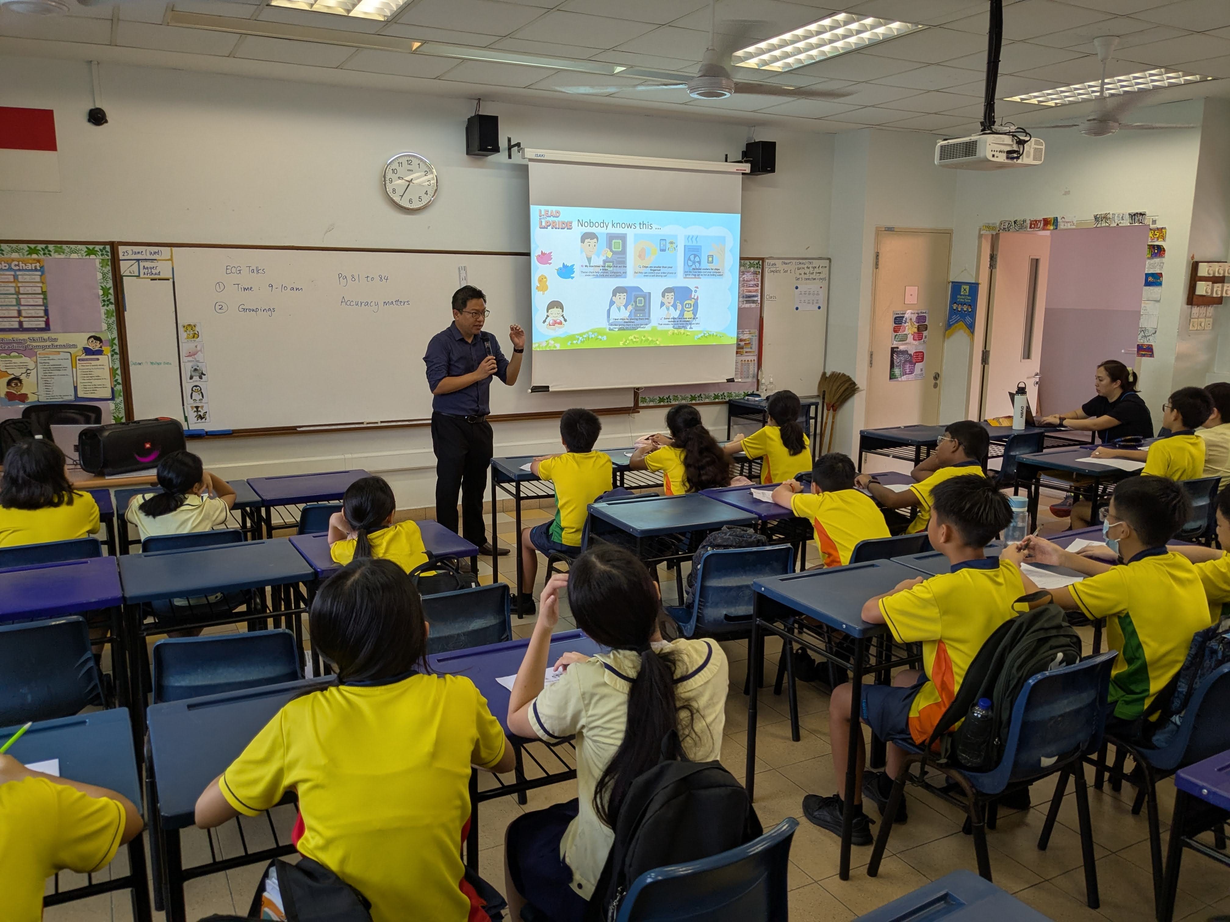A parent speaker addressing the classroom with inspiring stories