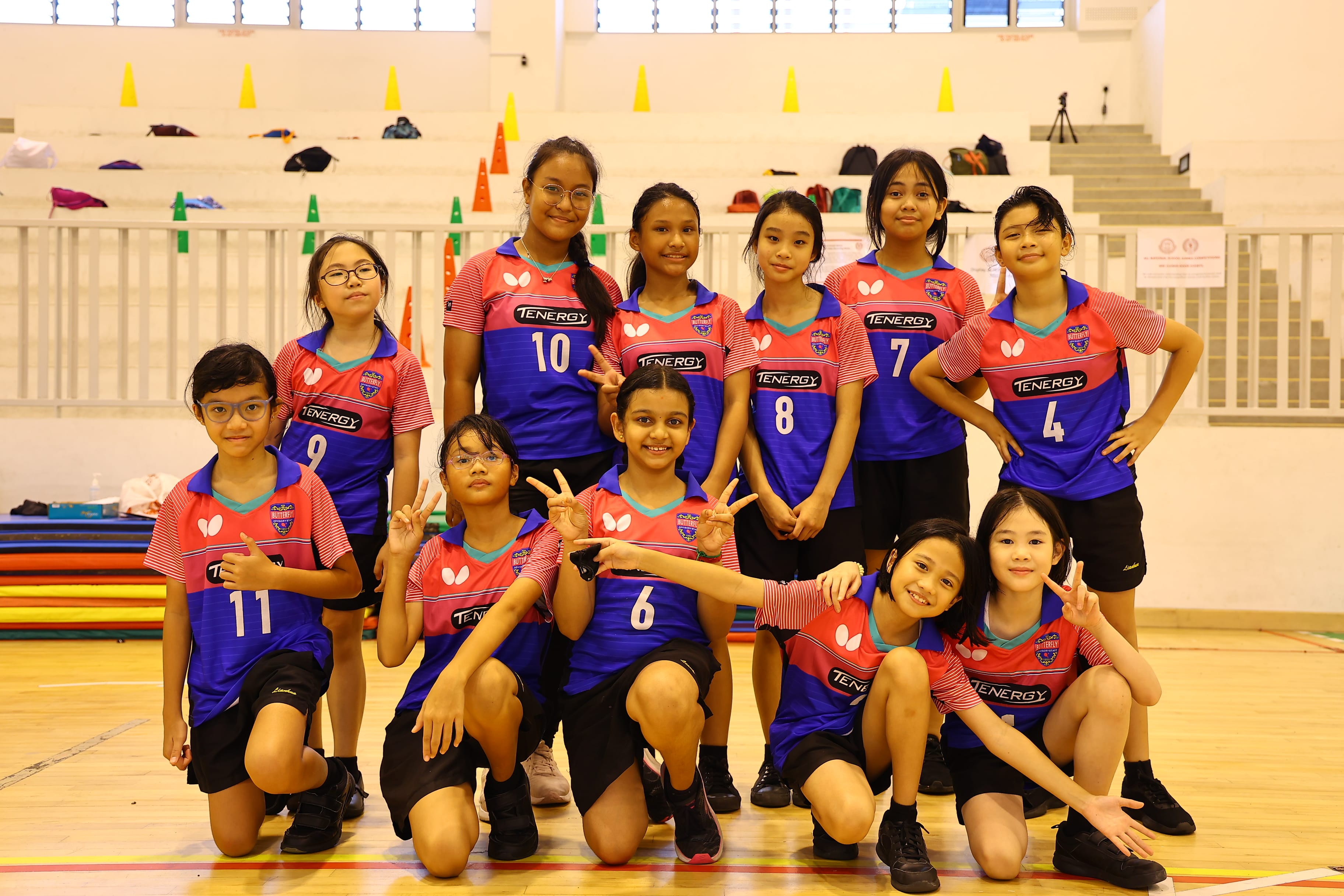 Lianhua volley ball girls posting as a group.