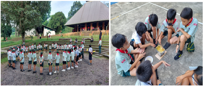 Students in scout uniforms with red scarves stand in a circle outdoors; others crouch on pavement examining an object.