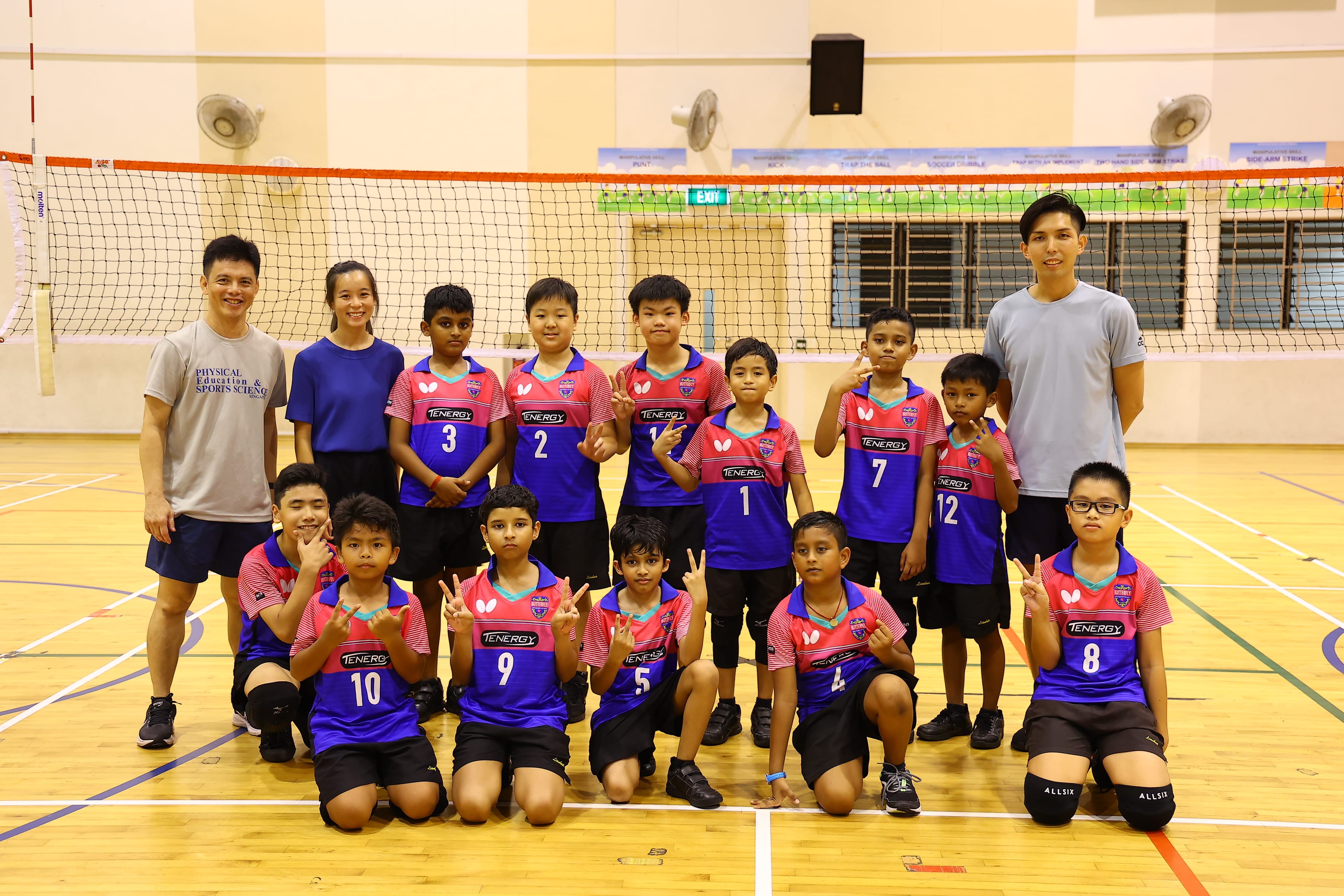 Volley ball boys with coaches and teacher