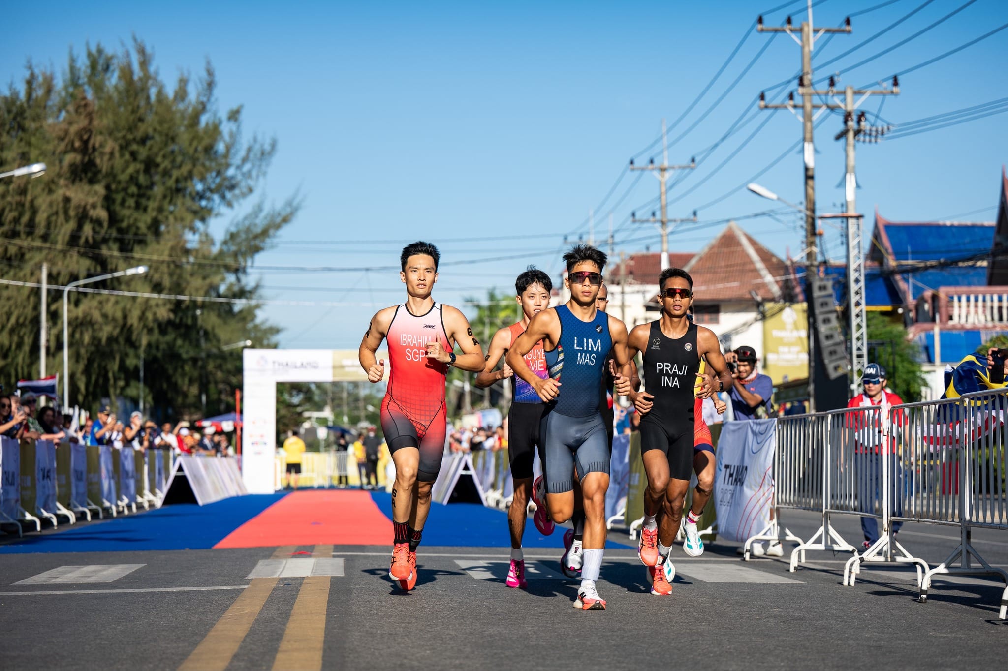 Mr Ahmad Arif Bin Ibrahim competing in Duathlon against competitors.