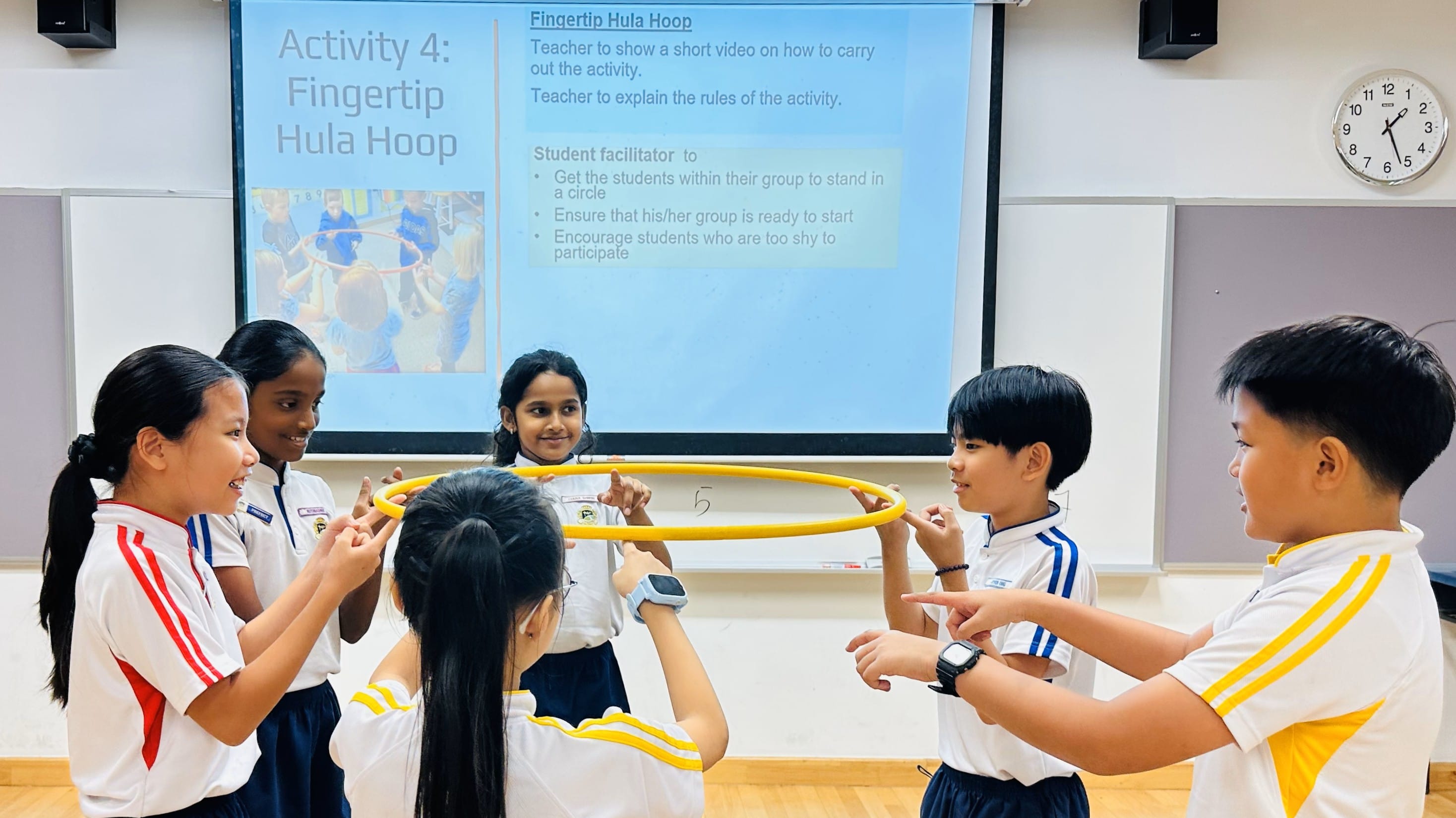 Students collaborating in preparation for their facilitating activity for P1 orientation