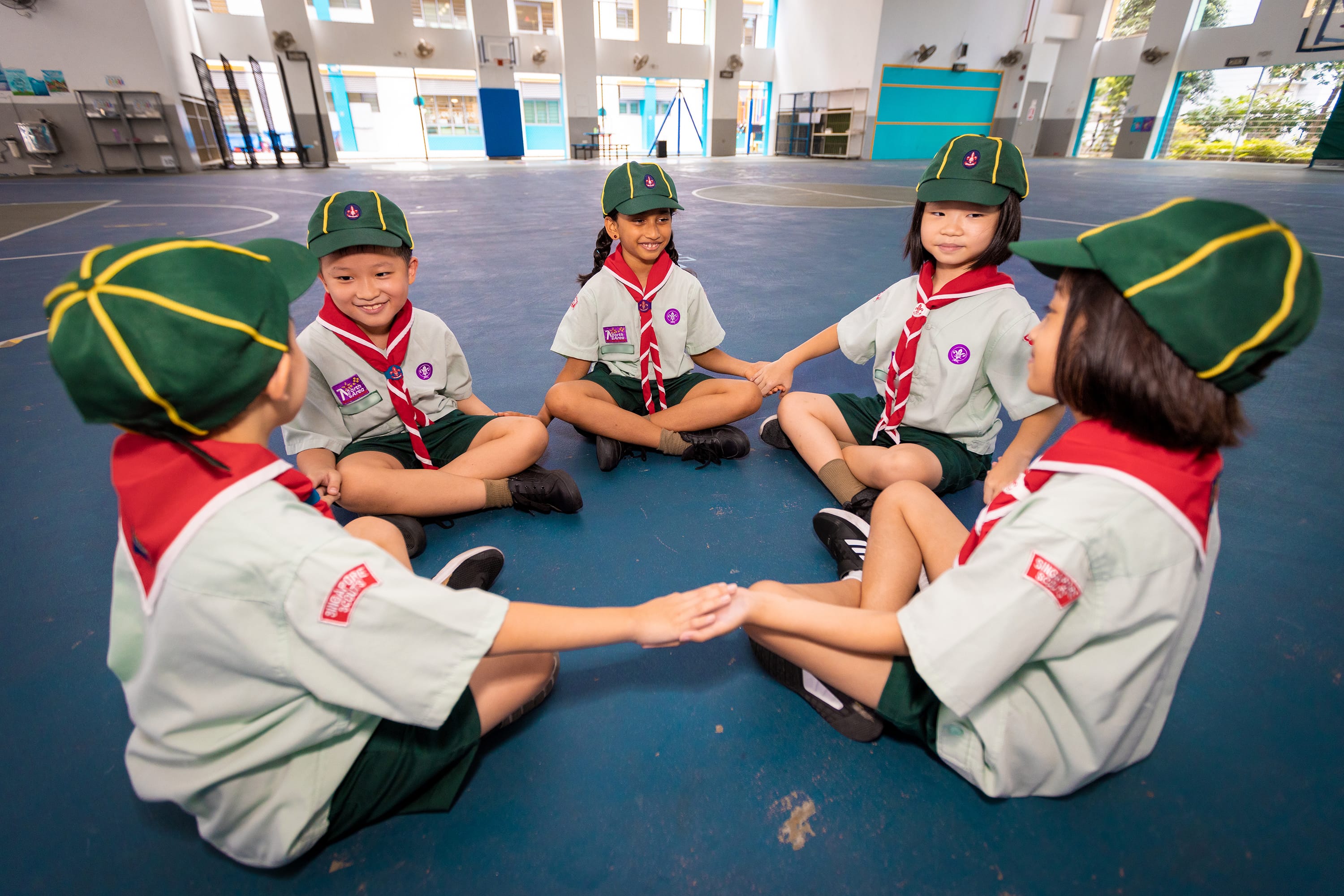 Cub Scouts singing campfire songs together