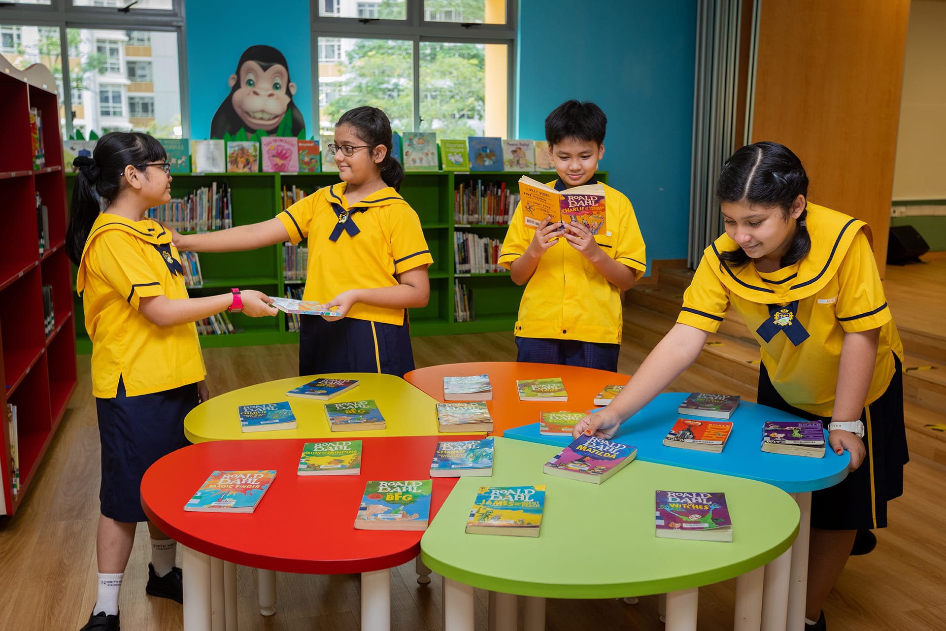 students engaging with books
