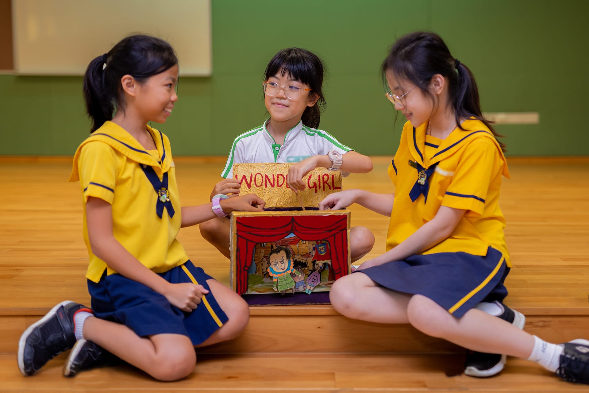 students creating a handmade theatre