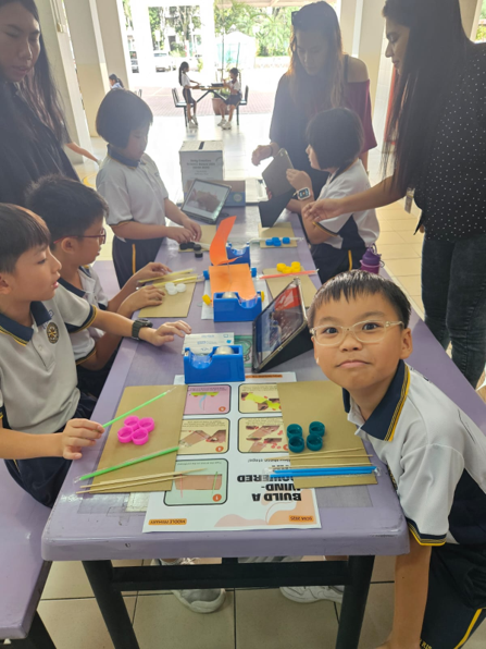 Students put their creativity into action during recess, drawing inspiration from Sony Creative Toy videos to independently build and experiment with their own simple toys.