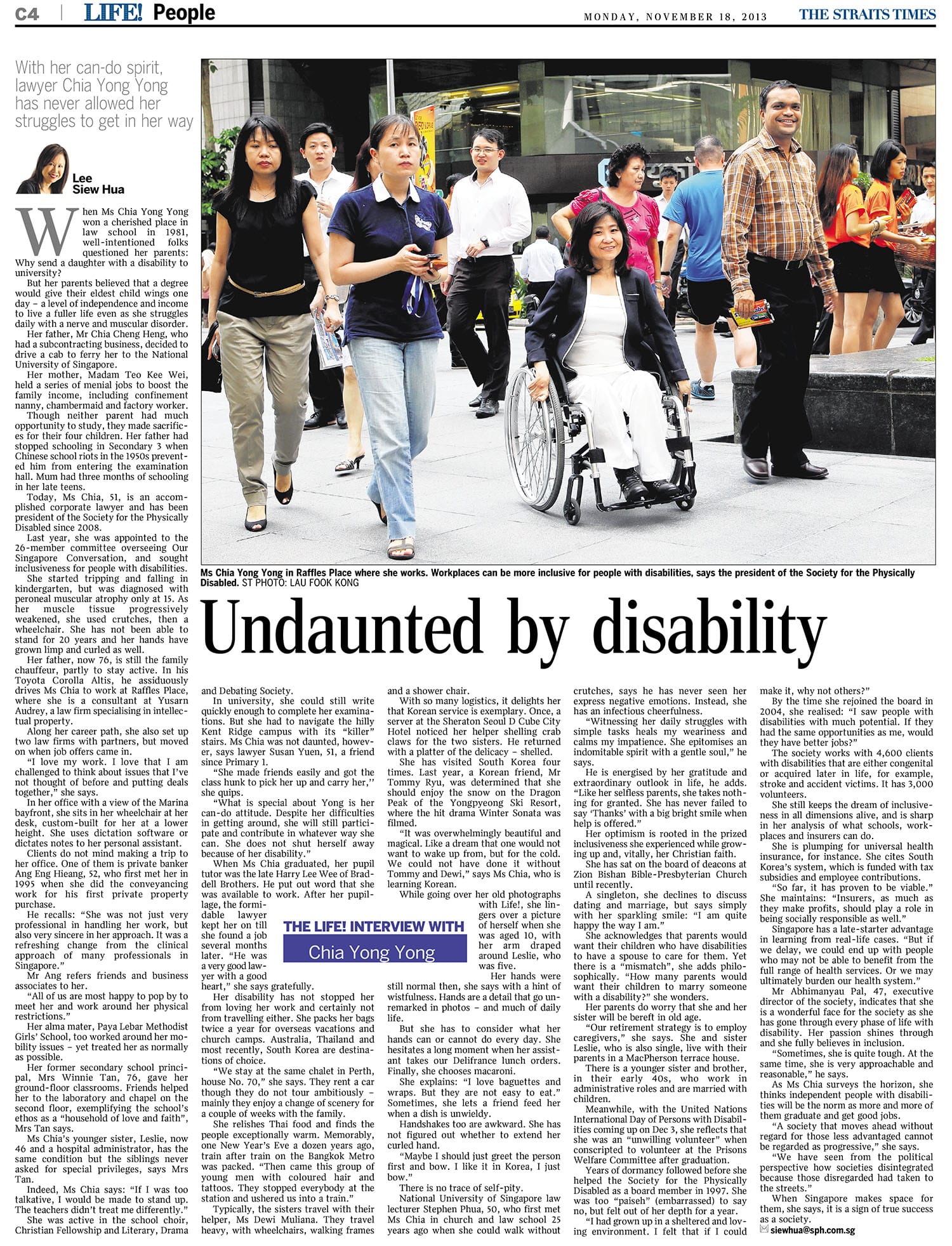 Newspaper article from The Straits Times featuring lawyer Chia Yong Yong in a wheelchair at Raffles Place.