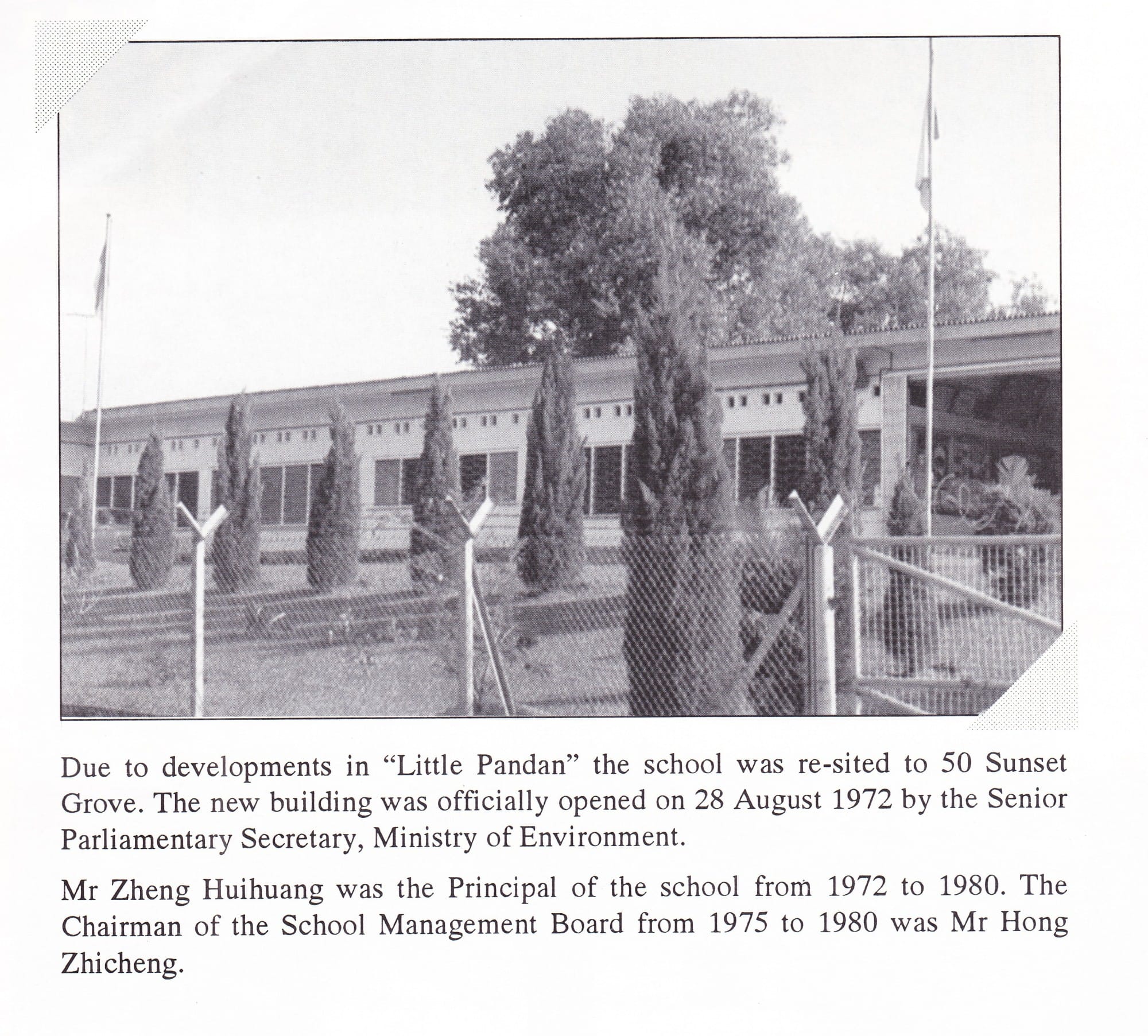 Black-and-white photograph Pei Tong Primary School building at 50 Sunset Grove, behind a row of trees and a chain-link fence, with historical text below..