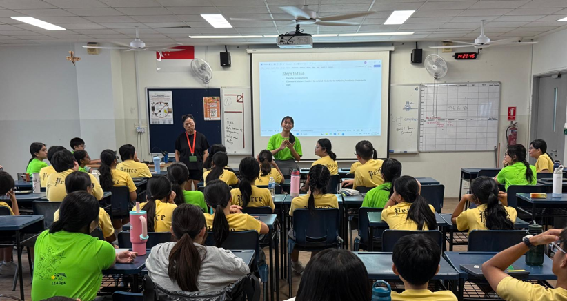 EXCO member briefing SLs during meeting