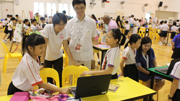 students showcase their project work with parents