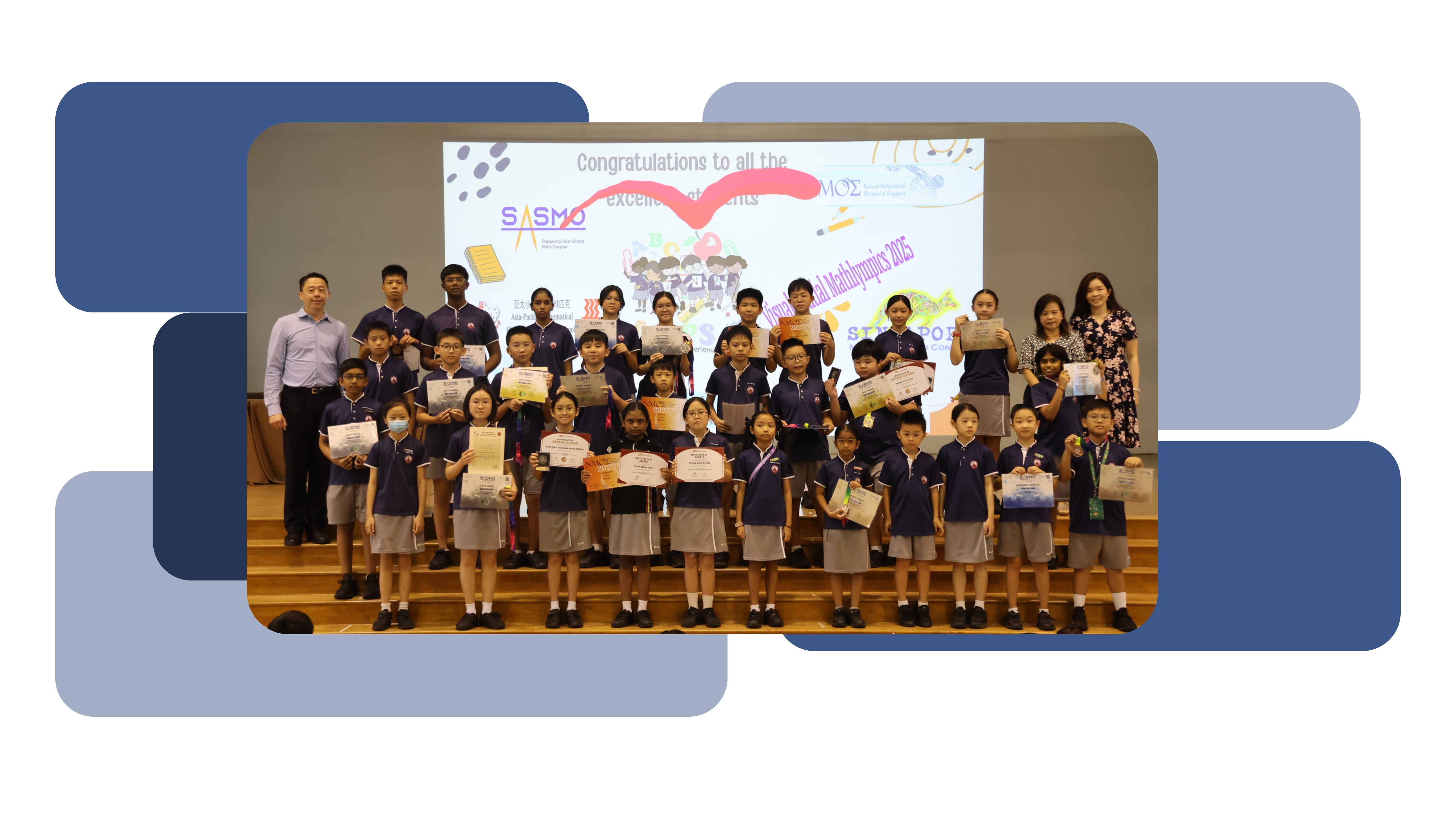 Group of students in blue uniforms holding trophies on a stage before a Mathematics Rising Stars banner.