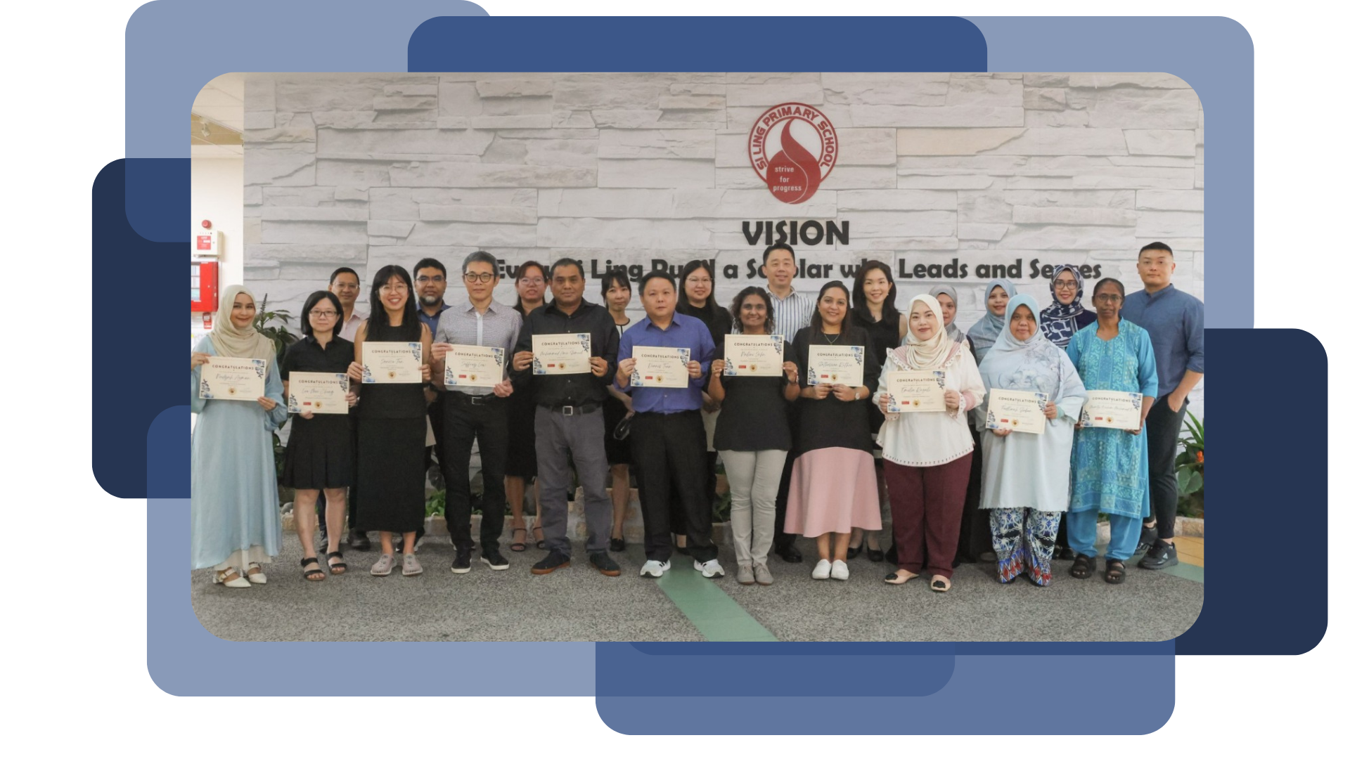 Group of adults holding congratulations certificates in front of Si Ling Primary School vision wall.