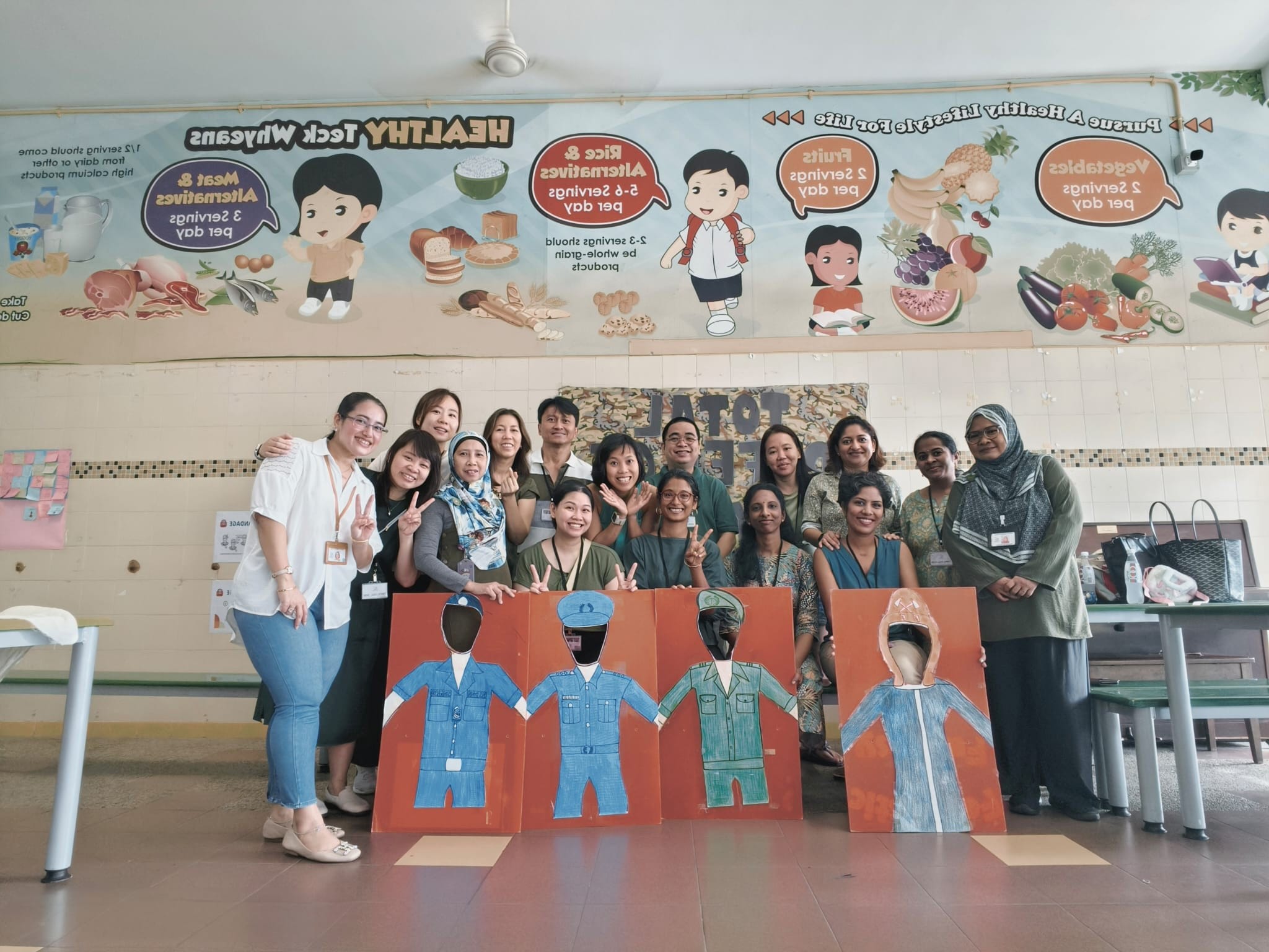 Group photo of Parents Support Group during Total Defense Day celebration.