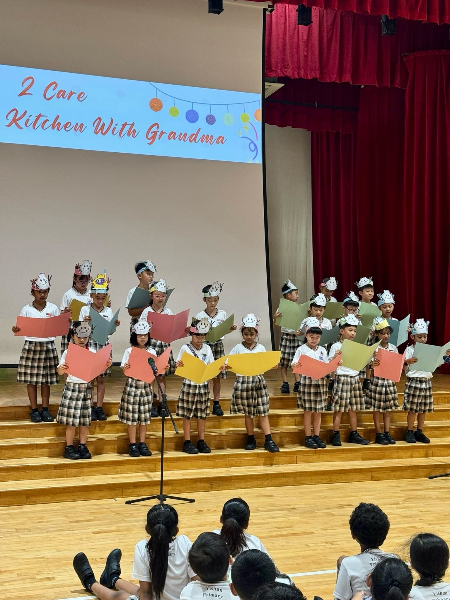 Students from 2 Care performing "Kitchen With Grandma" during Celebration of Learning.