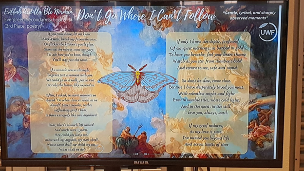 A monitor displays a poem titled "Don't Go Where I Can't Follow" with a butterfly on a painted background.
