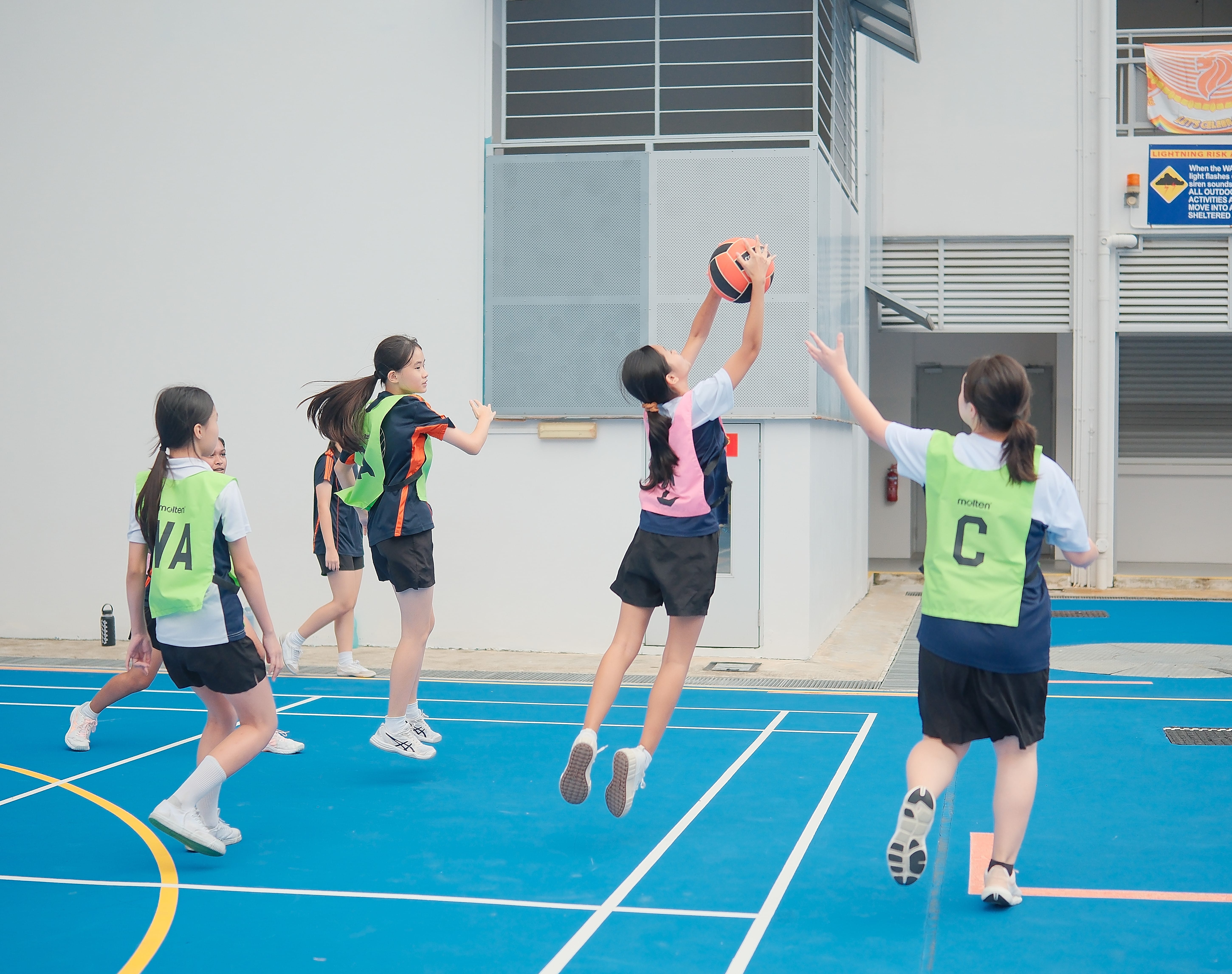 Image show netball girls in training