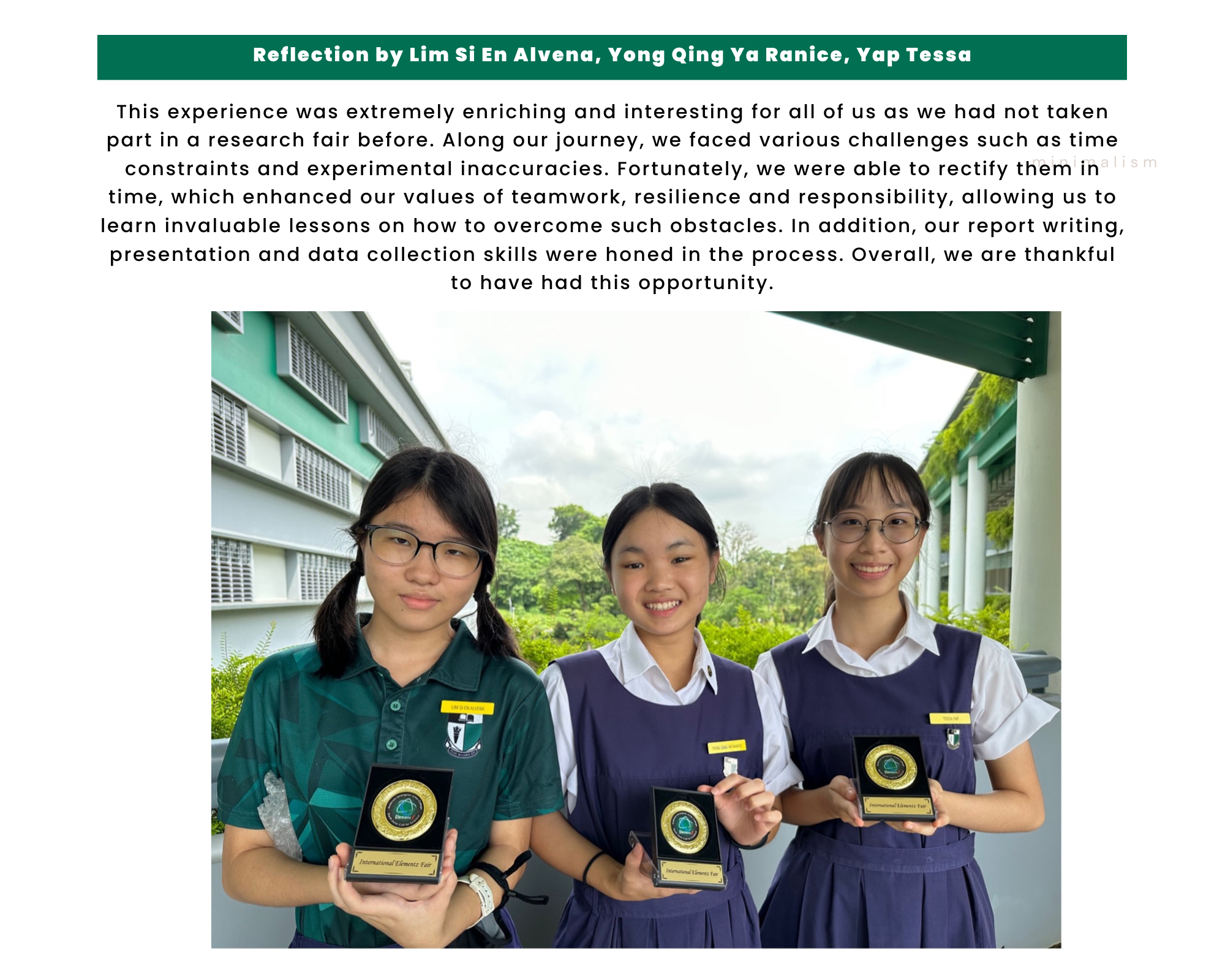 Three smiling teenage girls in school uniforms hold gold award medallion plaques outdoors near a school building.