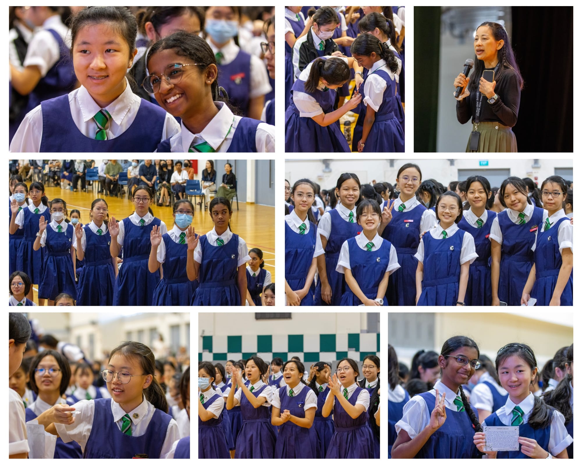 Girls in blue and white school uniforms participate in a school event, smiling, waving, and listening to a speaker with a microphone.