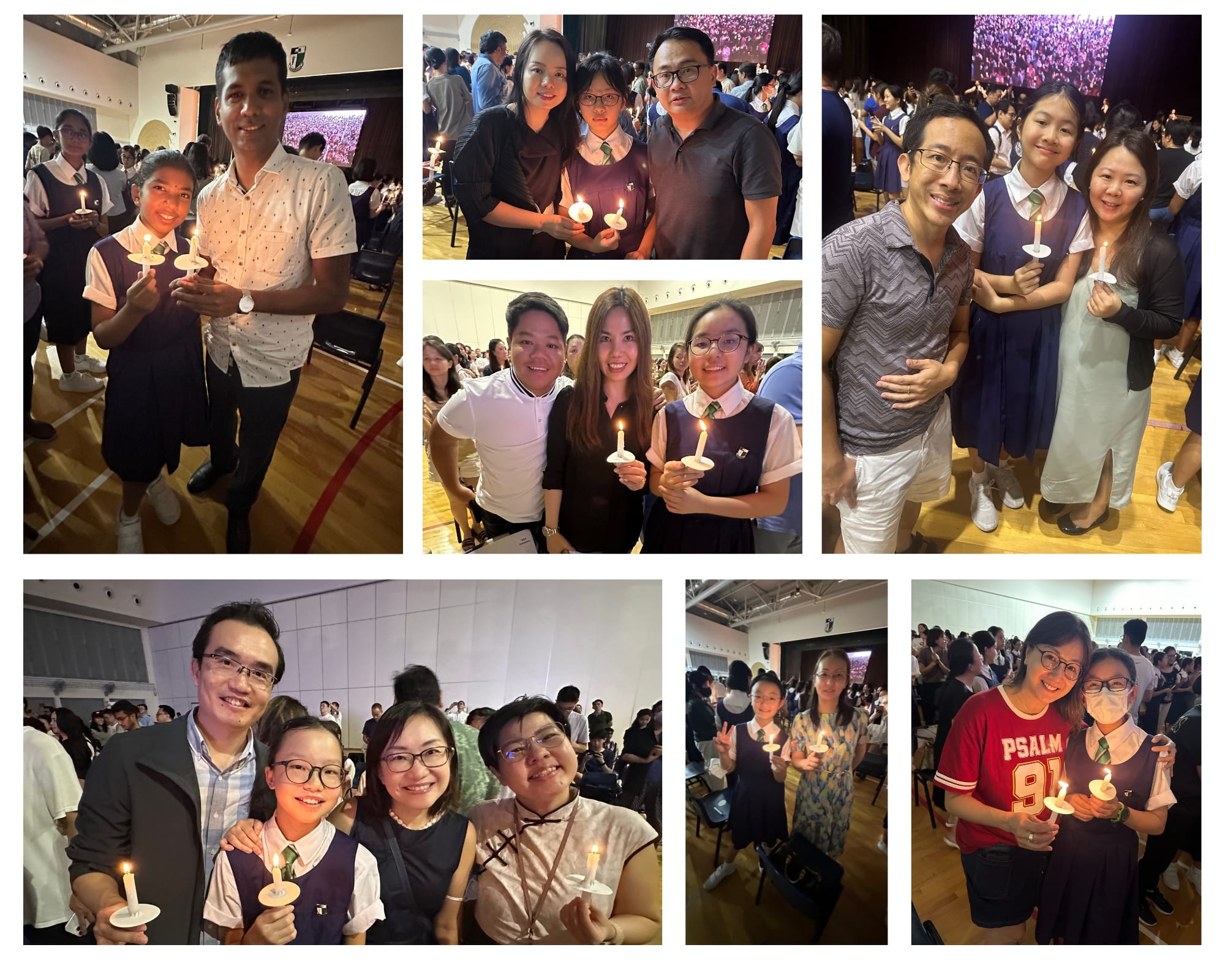 Groups of adults and uniformed students holding lit candles at an indoor school ceremony event.