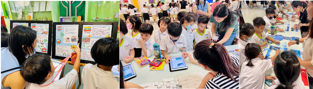 Children in school uniforms view colorful posters, gather around tablets, and work on activities at tables during a school event.