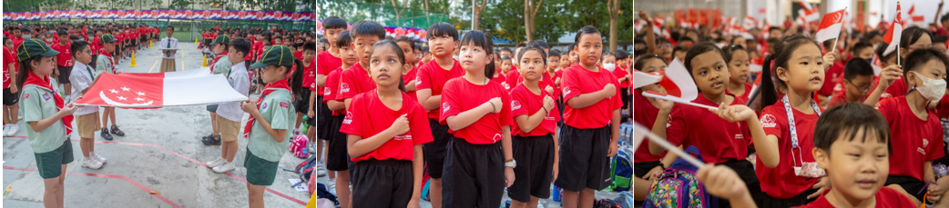 Children in red uniforms participate in a Singapore National Day ceremony, holding the flag and waving small flags.
