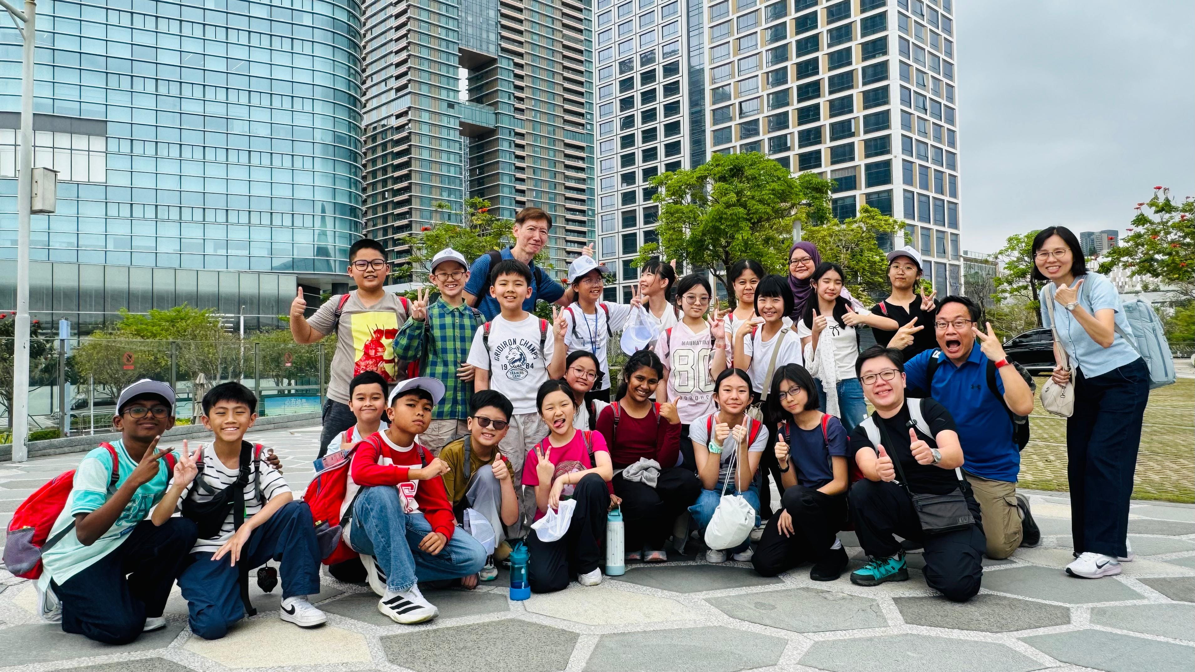 Students posing outdoors during an educational trip.