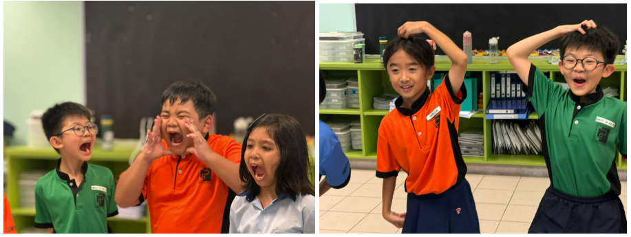 Four children in school uniforms laughing and making expressive poses in a classroom setting.