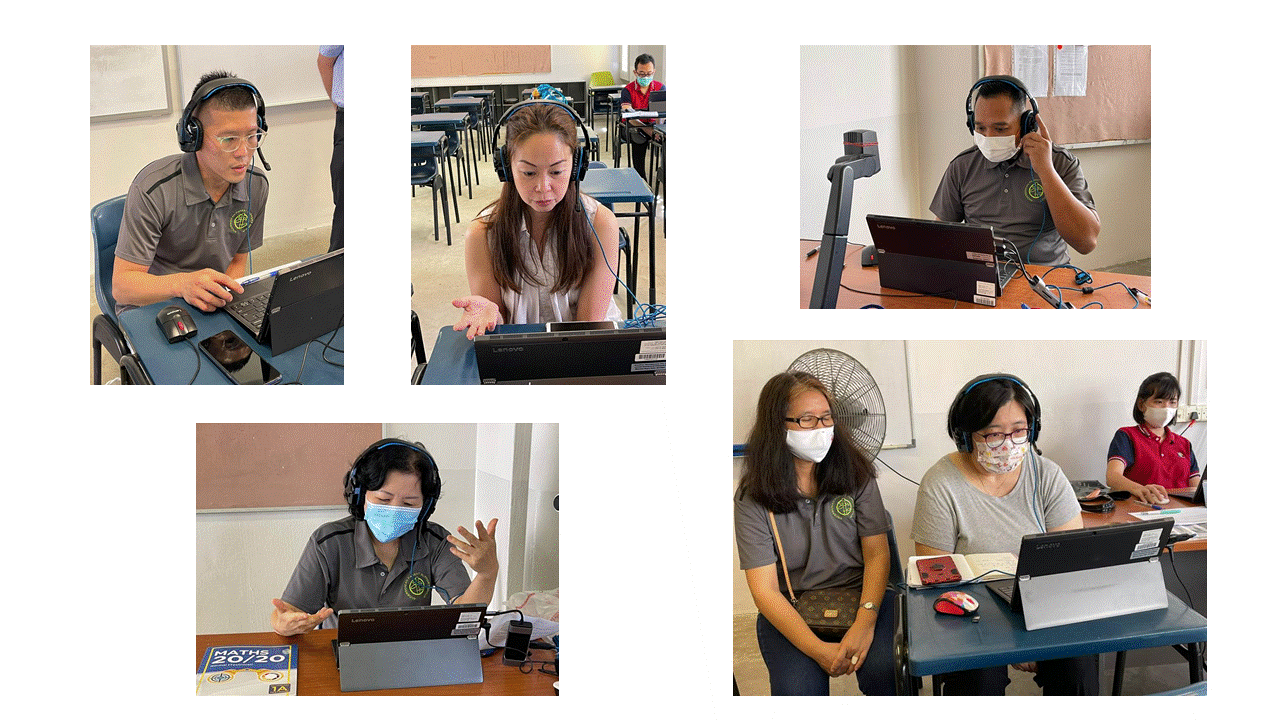 Five people wearing headsets sit at desks with laptops in a classroom, some wearing face masks.