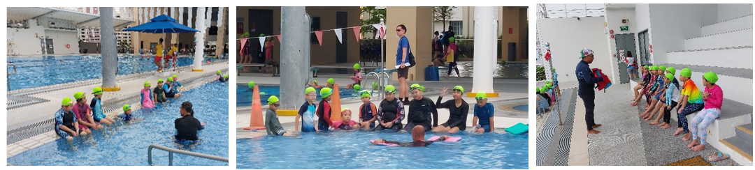 Children wearing green swim caps participate in a swimming lesson at an outdoor pool with an instructor.