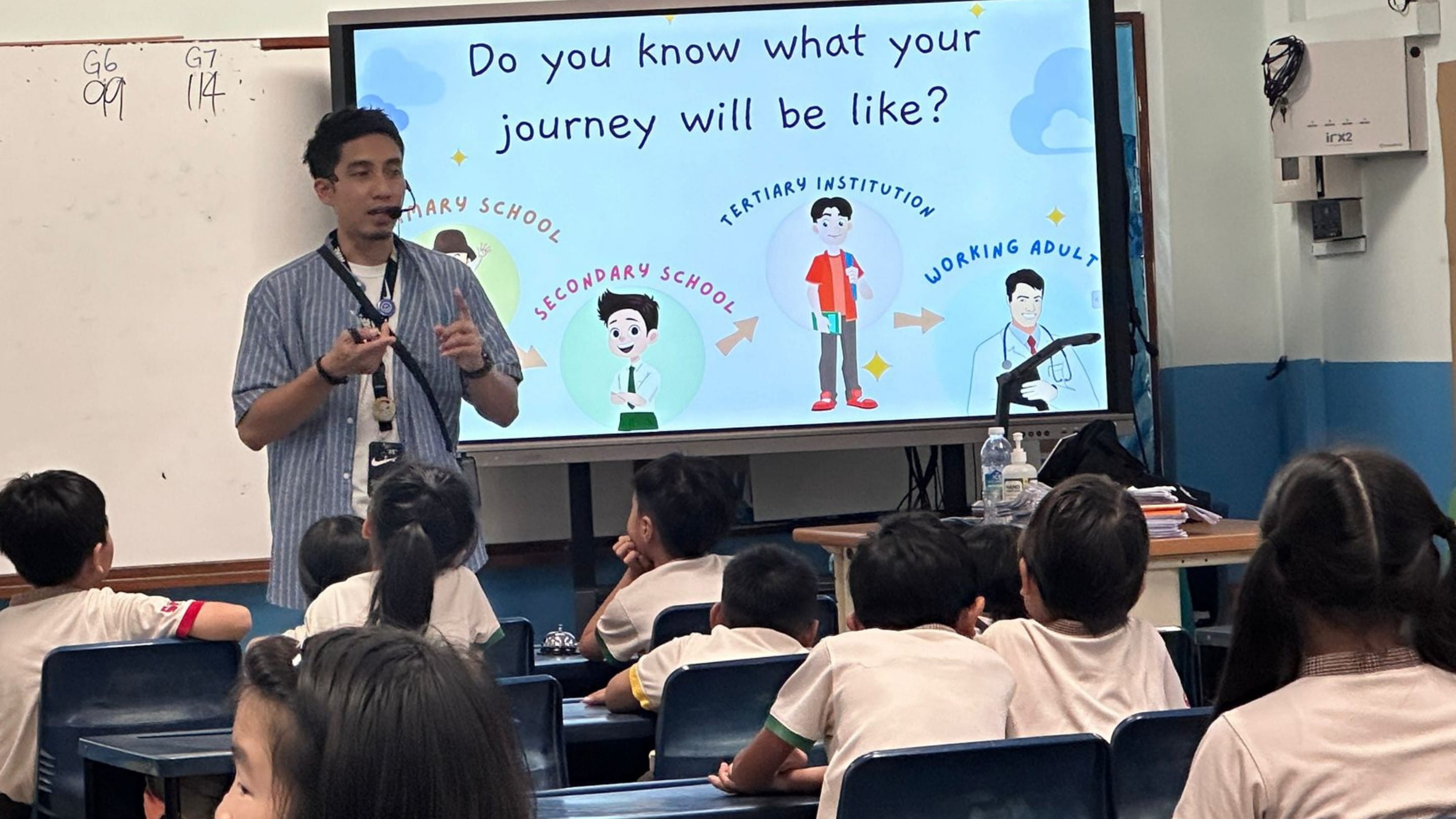 Students listening to a talk in a classroom