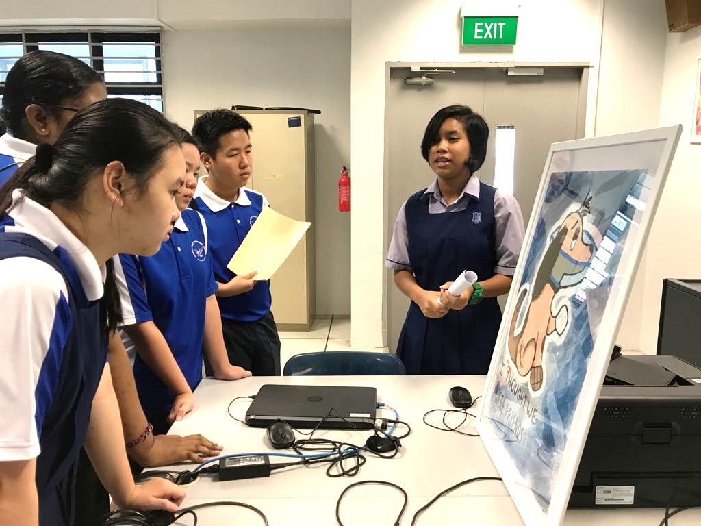 Azura from Secondary 2N2 presenting her group’s Digital Illustration created with the iPad Pro and Apple Pencil