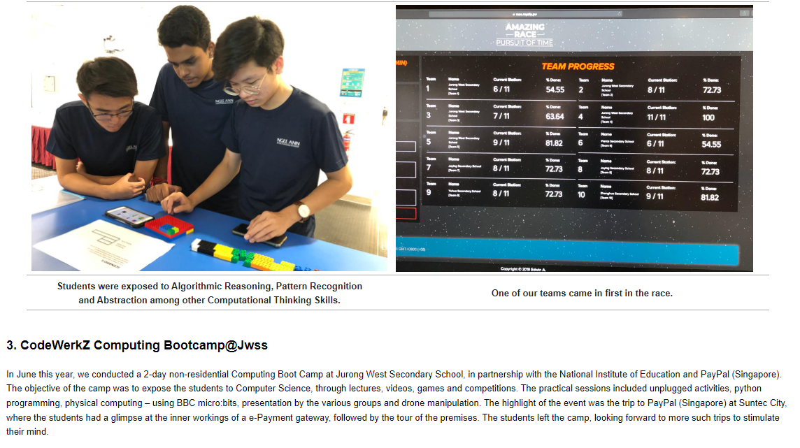 Three students in navy shirts work with colorful blocks on a blue table, beside a team progress scoreboard screen.