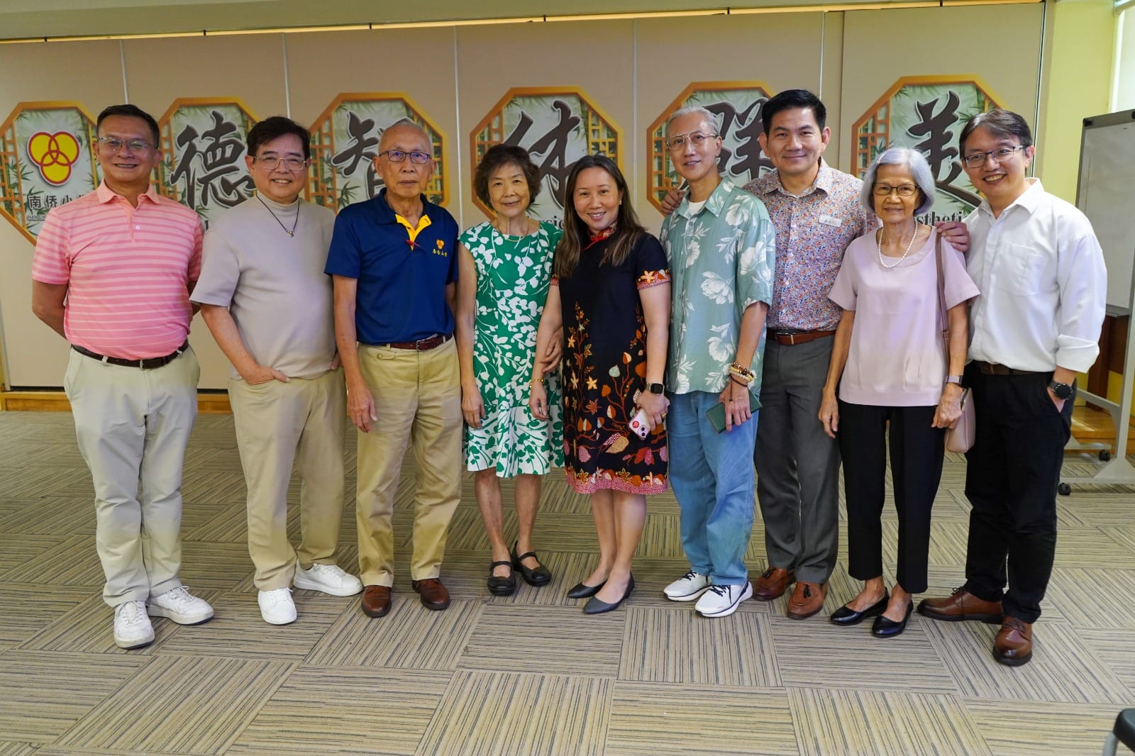 Alumni of Nan Chiau Primary School with the school principal