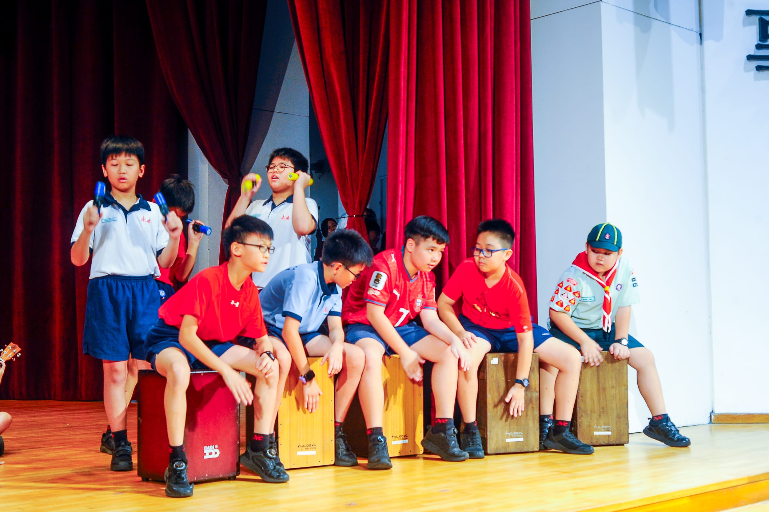 Students performing on stage