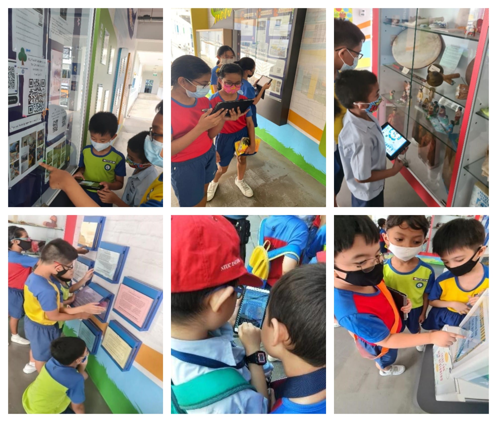 Young masked students in school uniforms explore museum exhibits using tablets during a field trip.