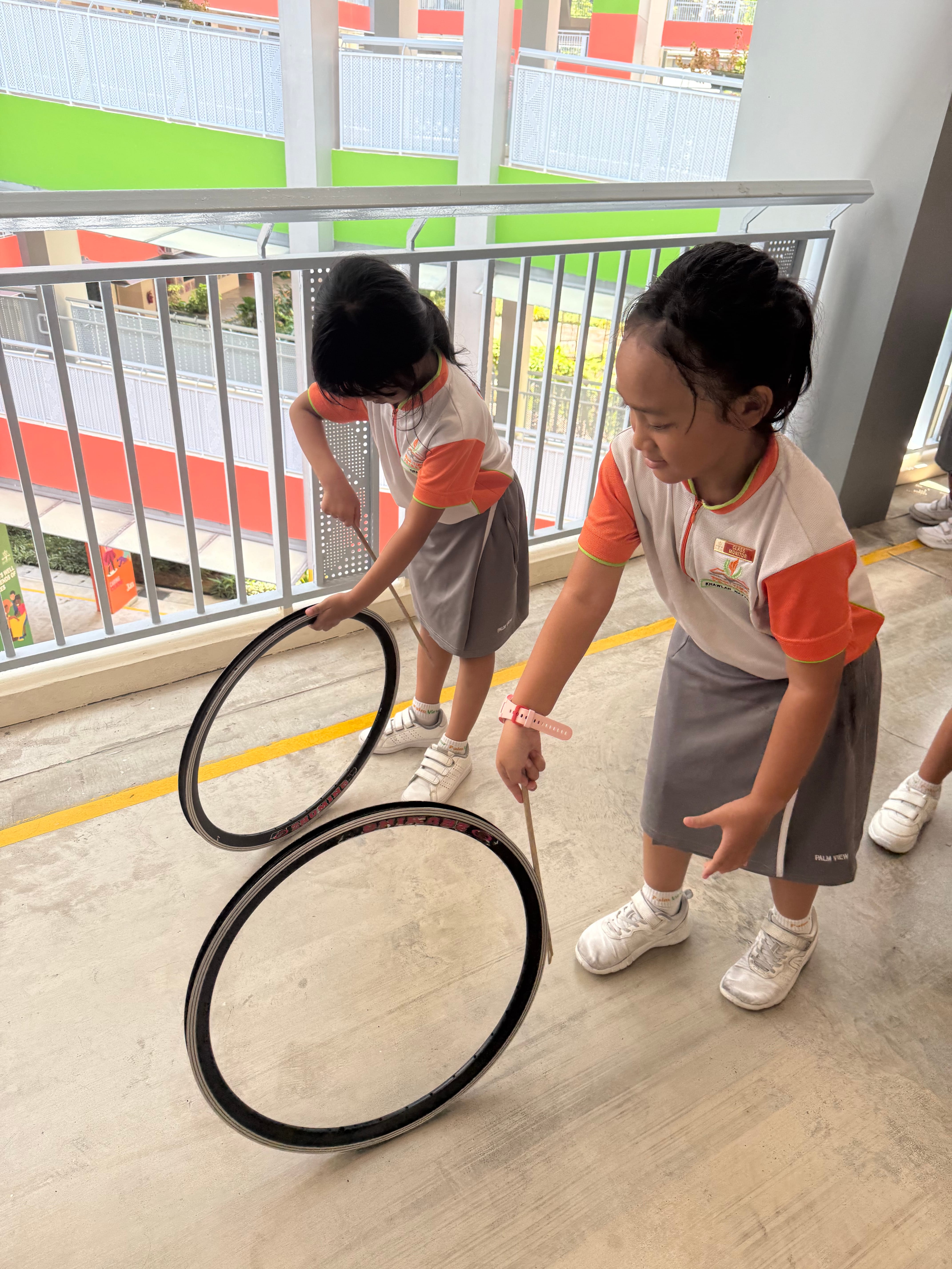 Girls playing games at the Mother Tongue Fortnight