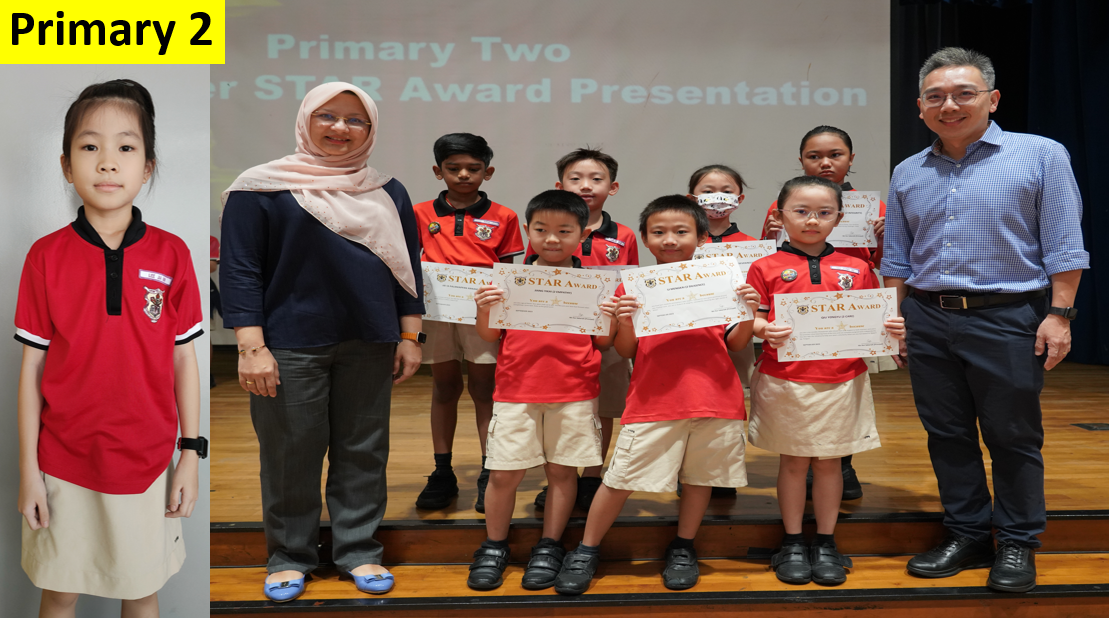 Primary 2 students in red uniforms hold STAR Award certificates on stage with two adult presenters.