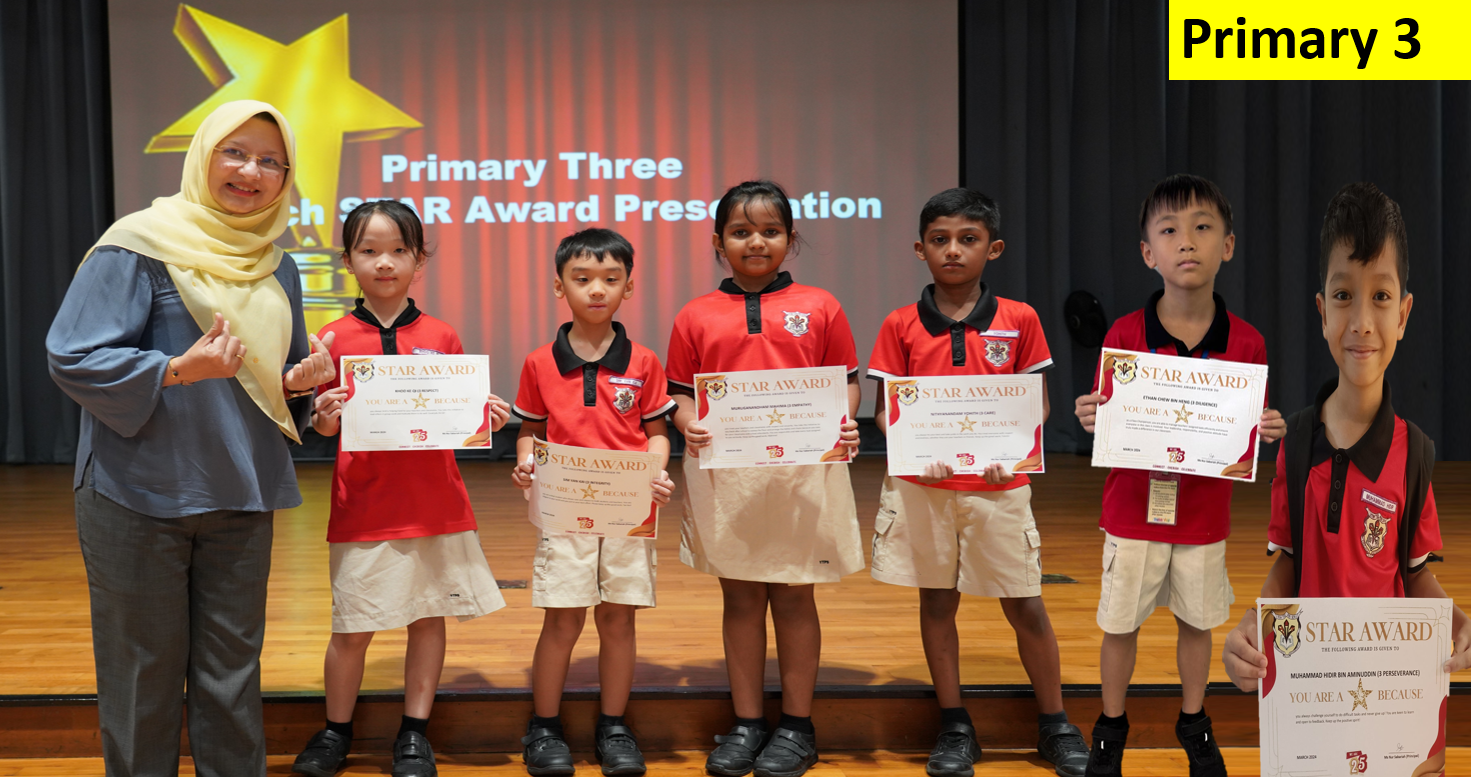 Six Primary 3 students in red uniforms hold Star Award certificates on stage with a teacher at an award presentation.