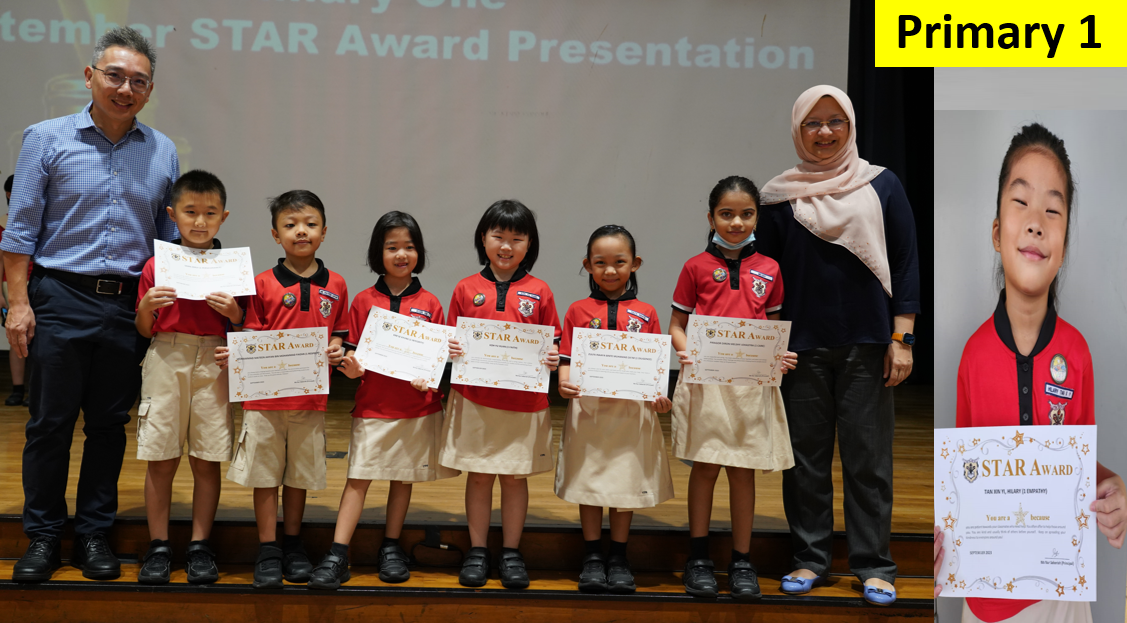 Six young students in red uniforms hold STAR Award certificates on stage, flanked by two adult teachers.