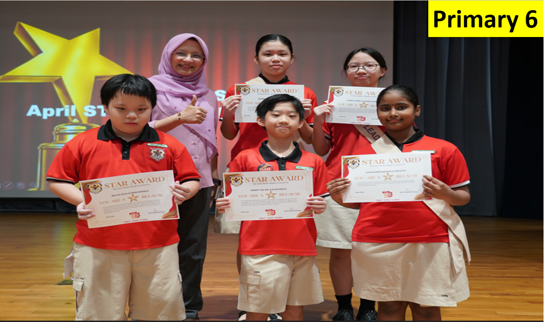 Five Primary 6 students in red uniforms hold Star Award certificates, posed with a teacher giving a thumbs up.