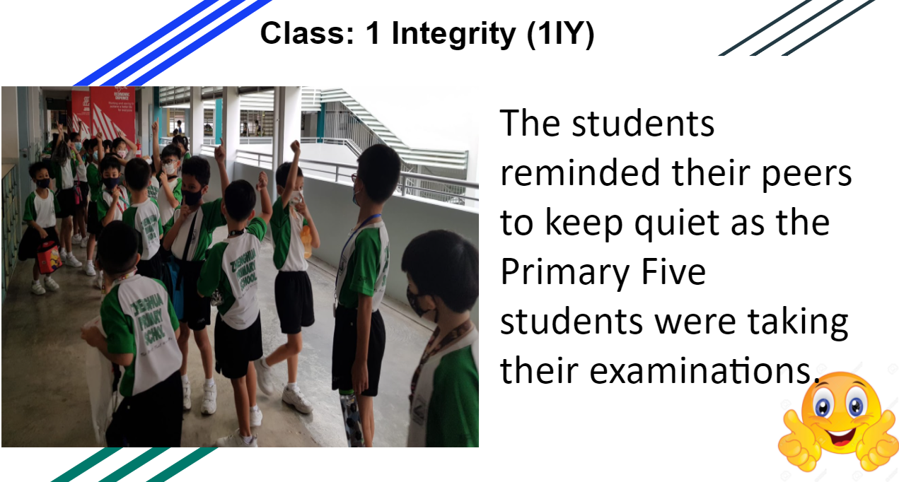 Students in green and white uniforms with masks stand in a school corridor, one raising a fist.