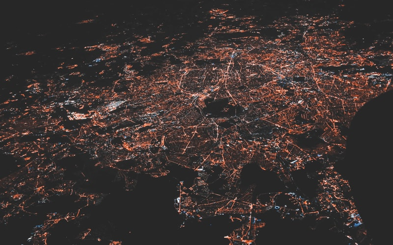 A stock image of an aerial view of a city at night